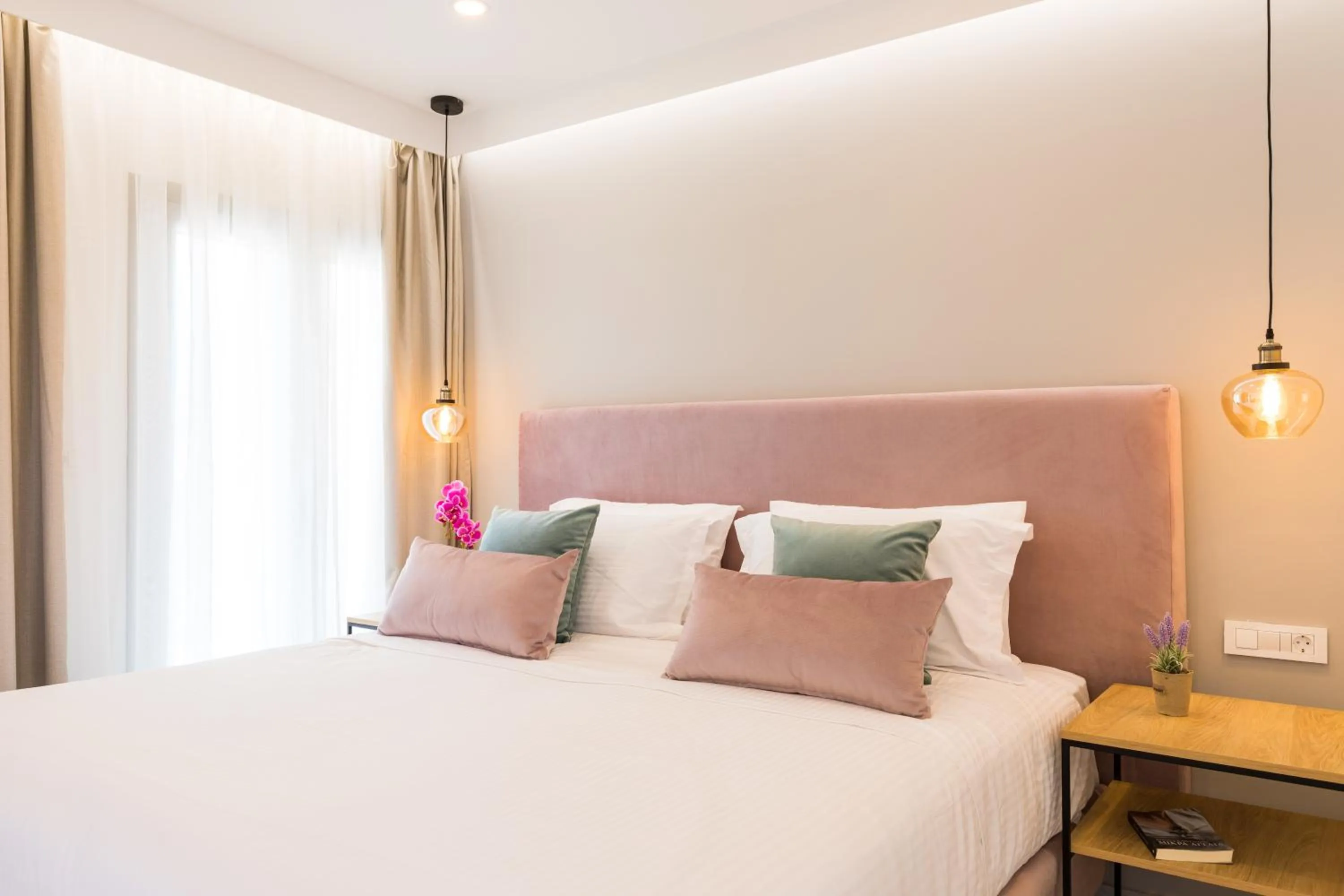 Bed in V Luxury Suites