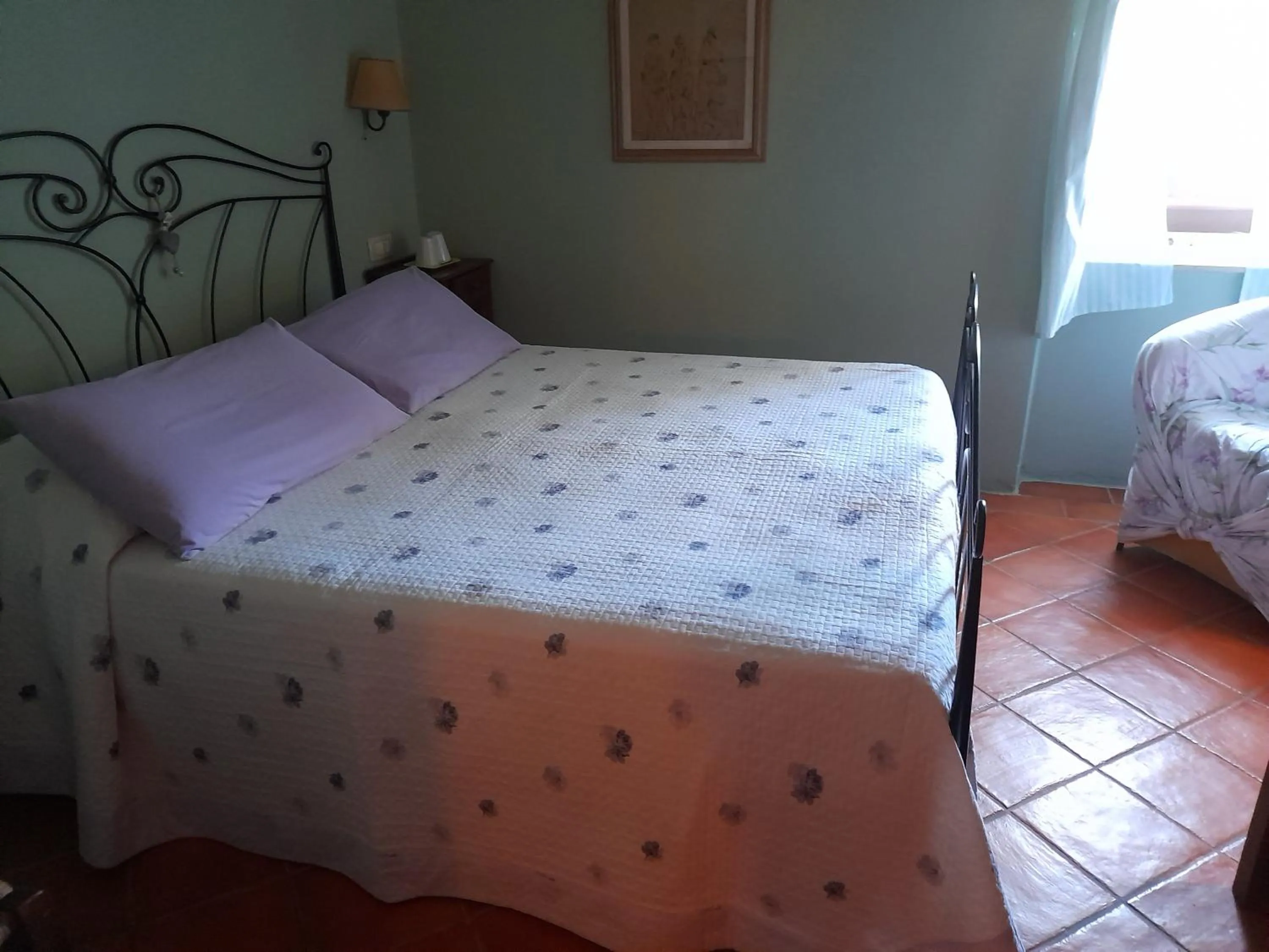 Bed in Gli Ulivi Bed & breakfast