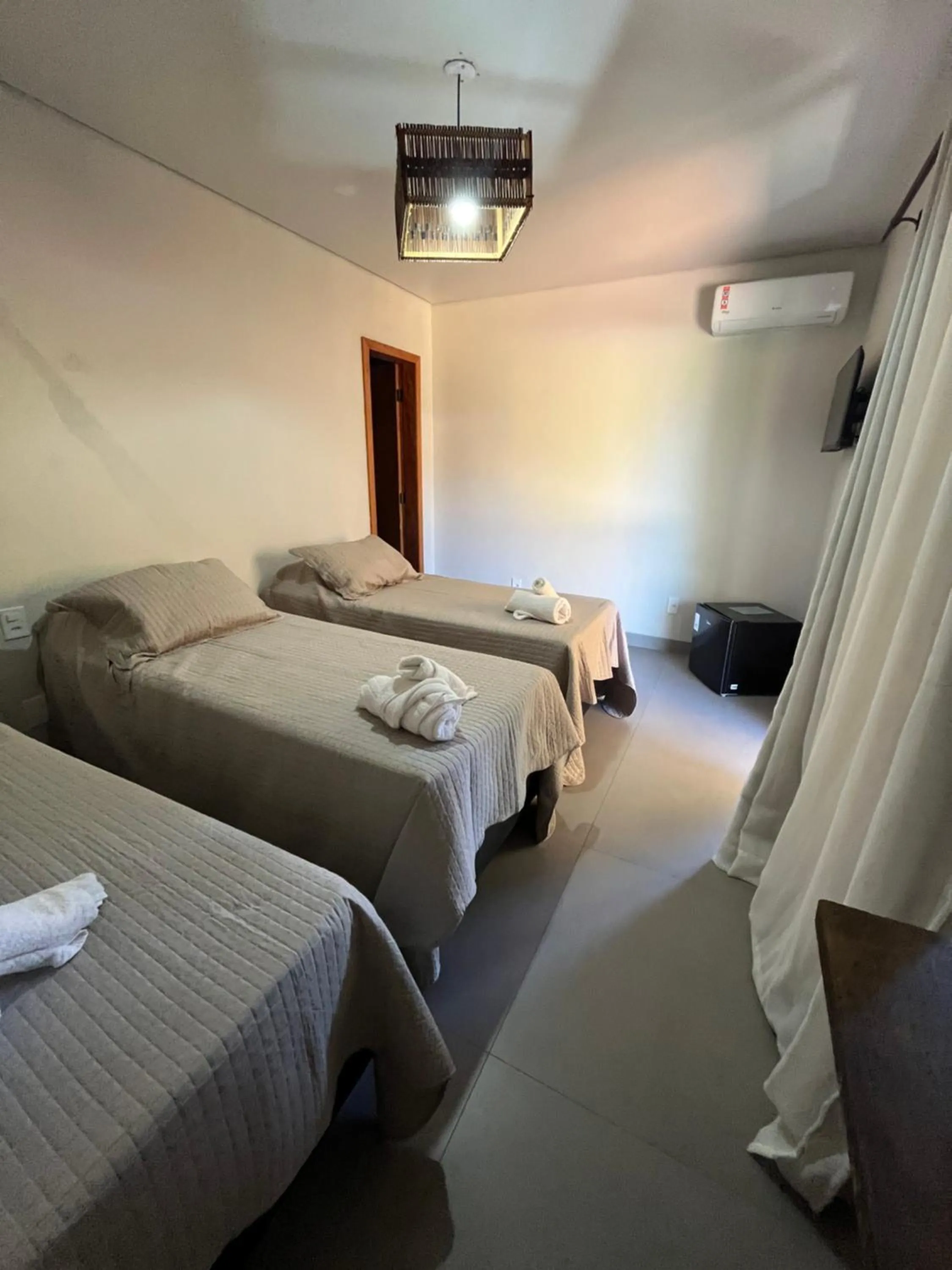 Bed in Pousada Vilarejo