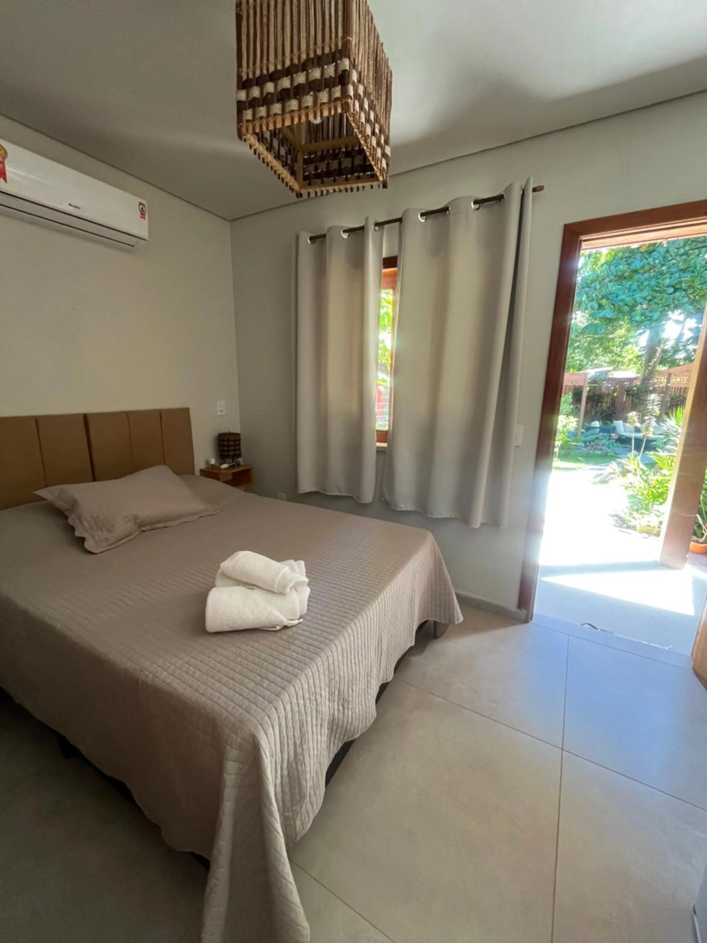 Photo of the whole room, Bed in Pousada Vilarejo