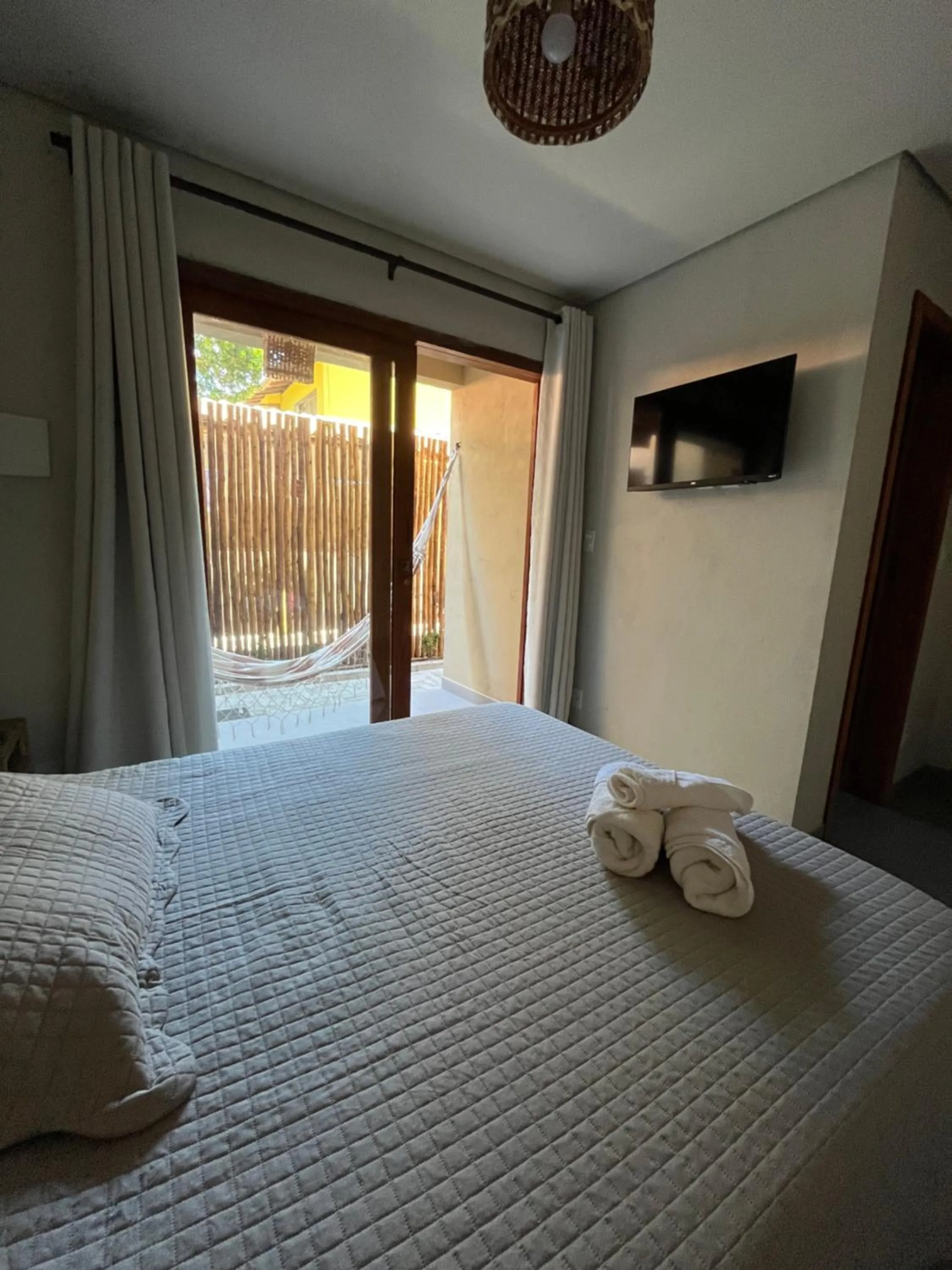 Bed in Pousada Vilarejo