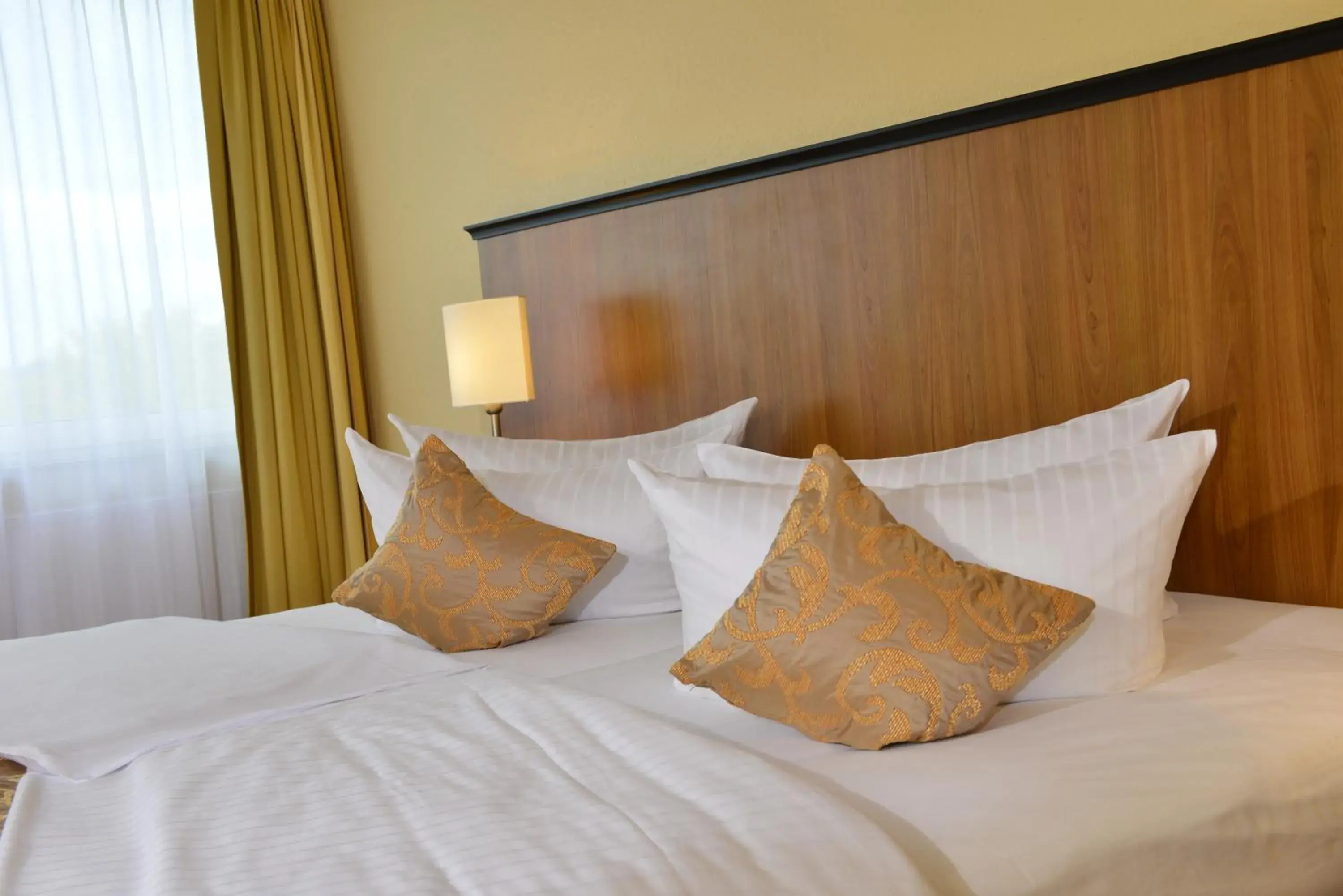 Photo of the whole room, Bed in Carathotel Basel/Weil am Rhein Photo of the whole room, Bed in Carathotel Basel/Weil am Rhein