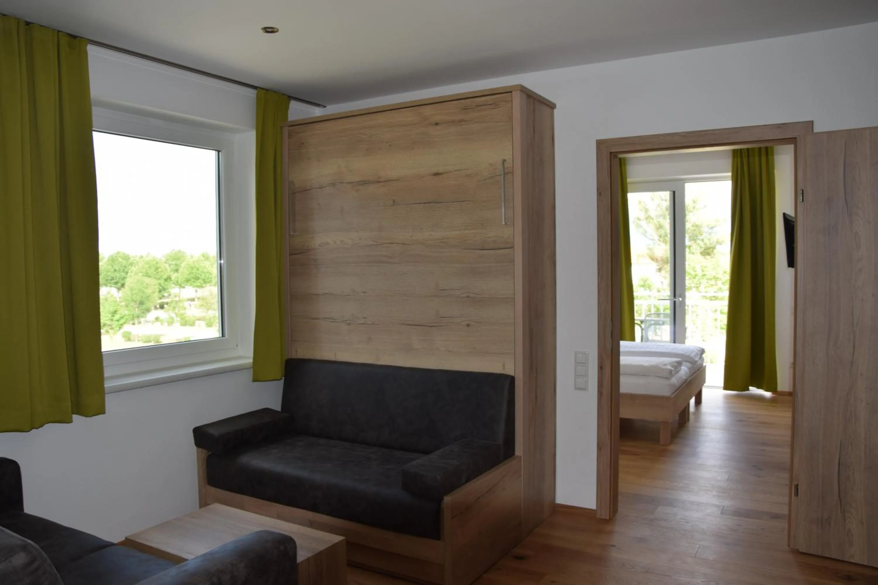 Living room, Bed in Seehotel Herlinde