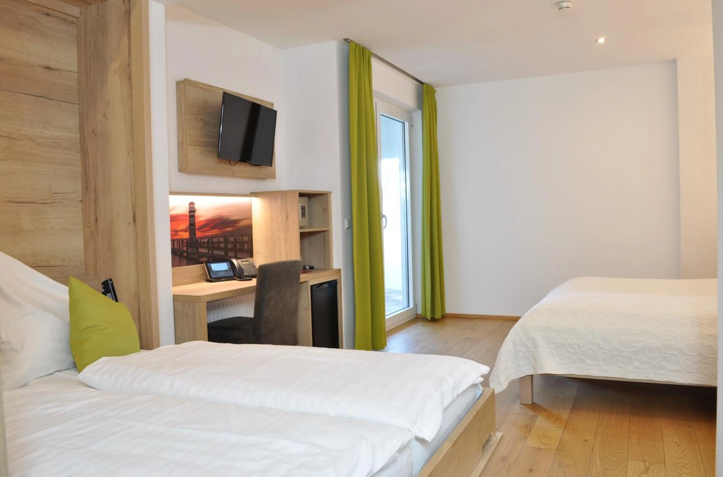 Photo of the whole room, Bed in Seehotel Herlinde