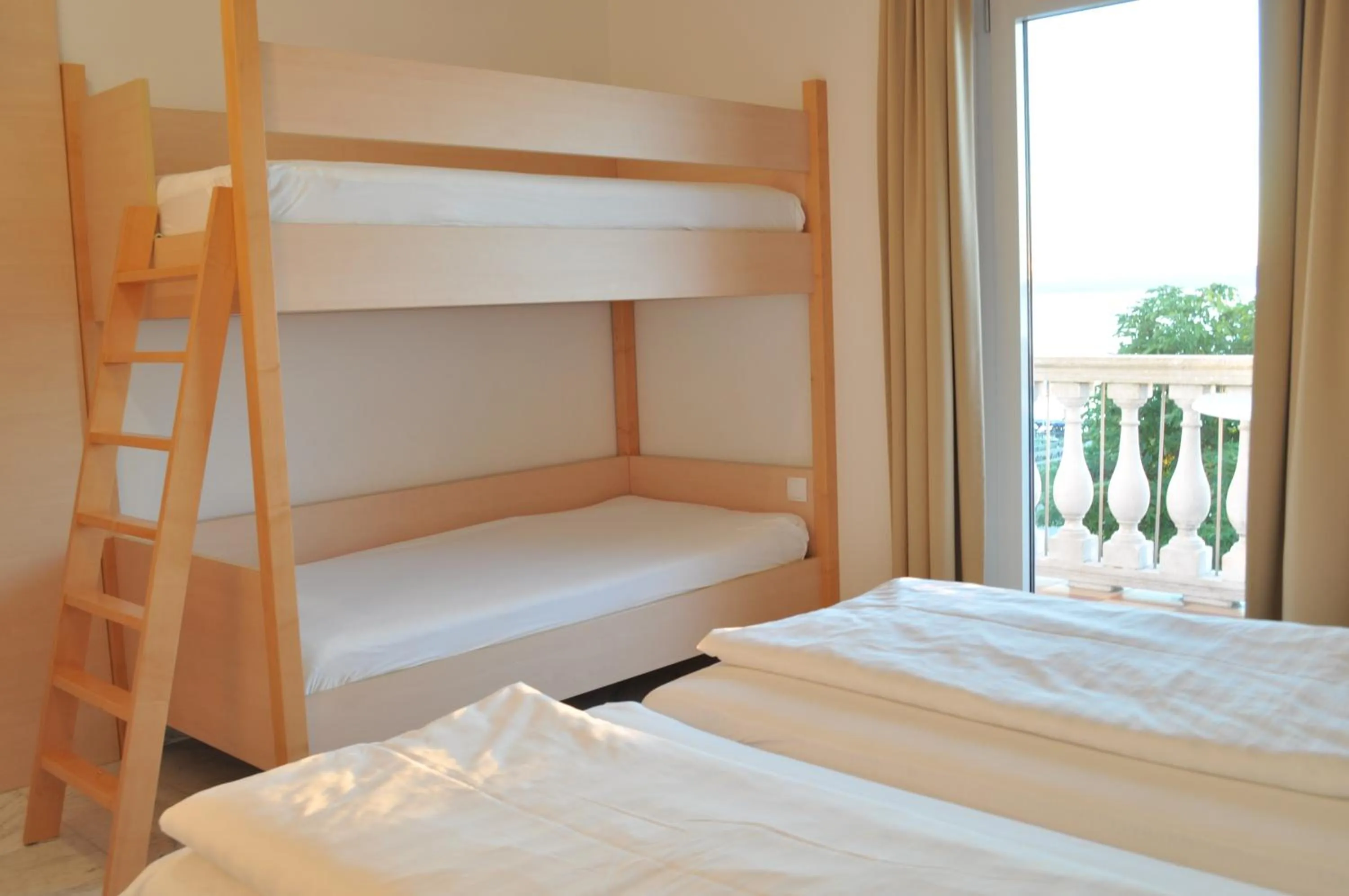Photo of the whole room, Bed in Seehotel Herlinde