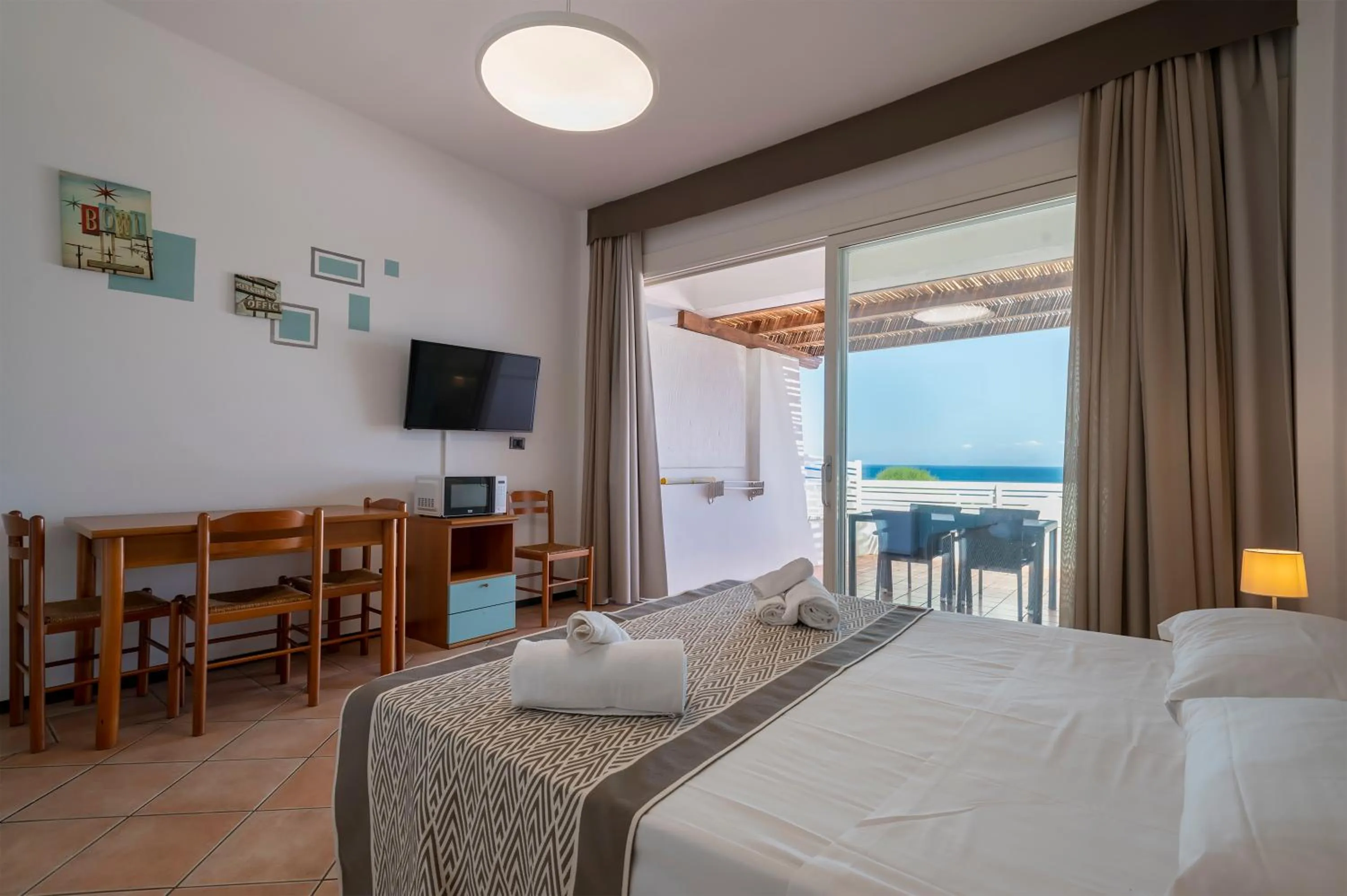 Photo of the whole room, Bed in Residence Le Vele