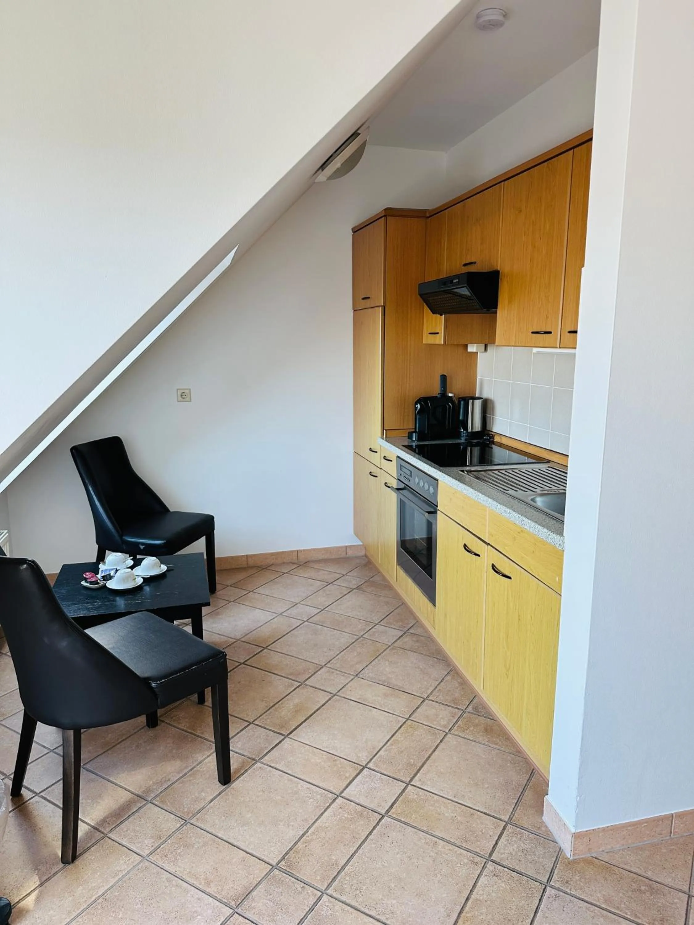 Kitchen or kitchenette in Hotel am Luisenplatz