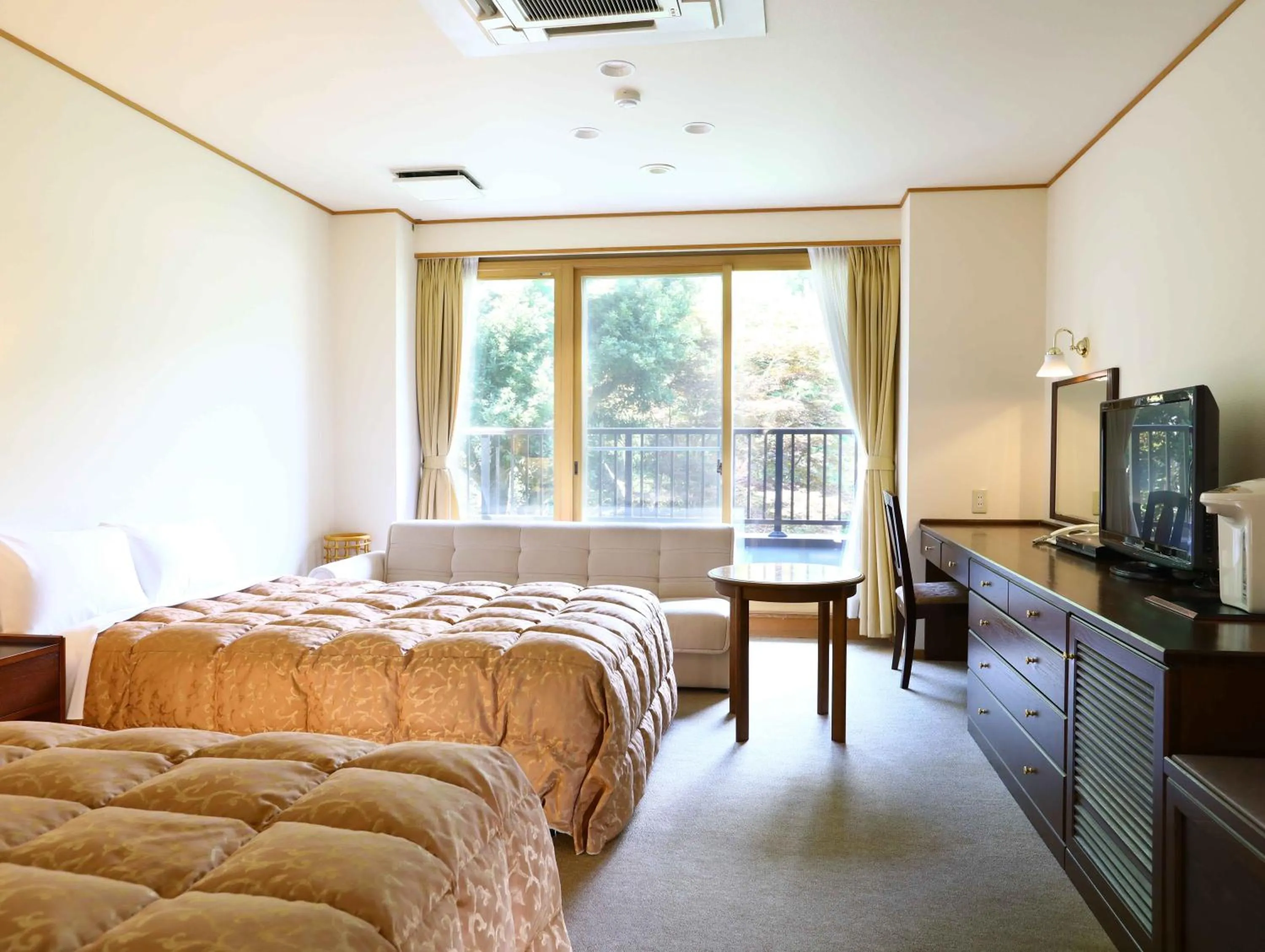 Facility for disabled guests, Bed in Yugawara Chiyodasou