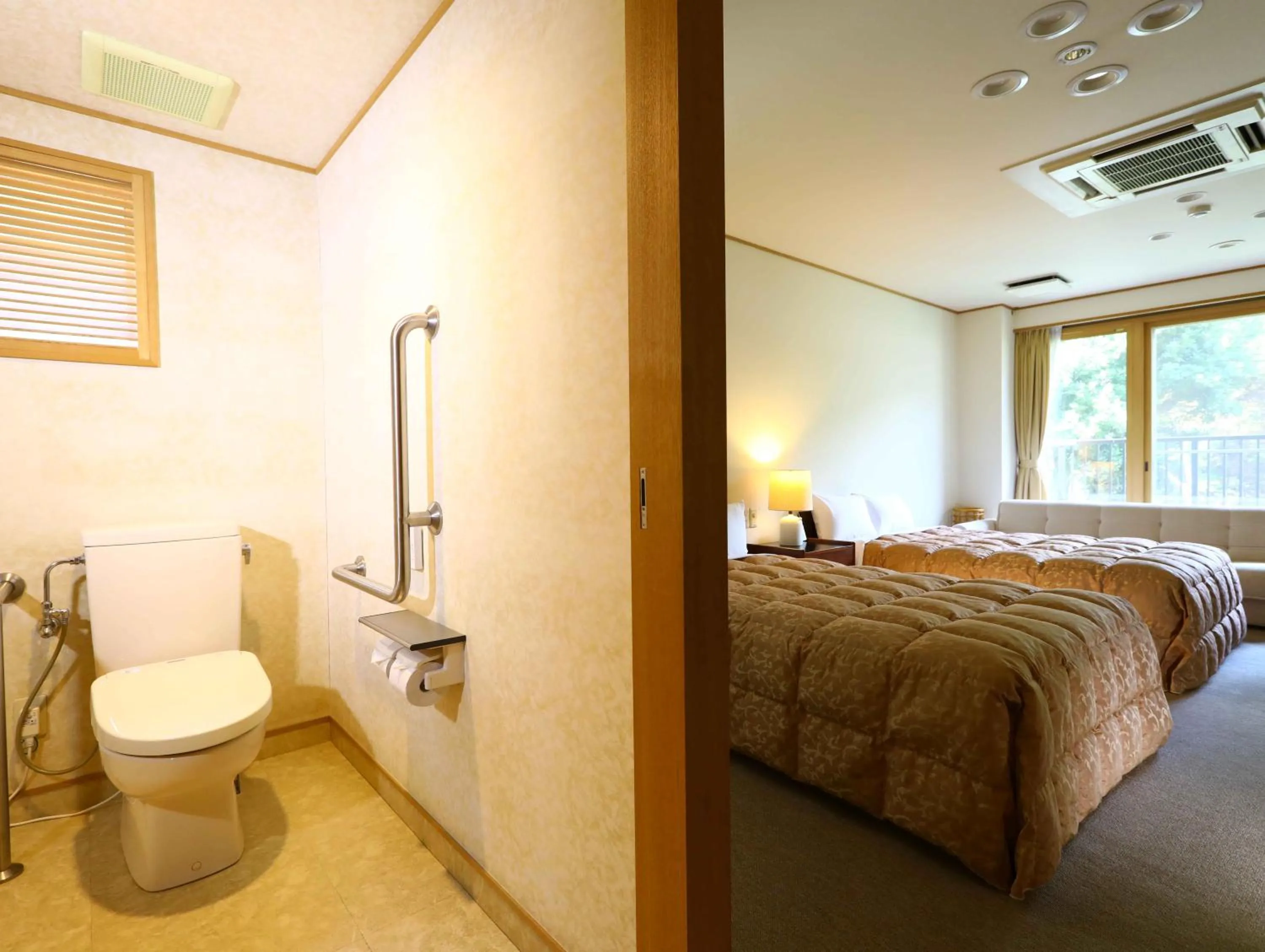Facility for disabled guests, Bed in Yugawara Chiyodasou