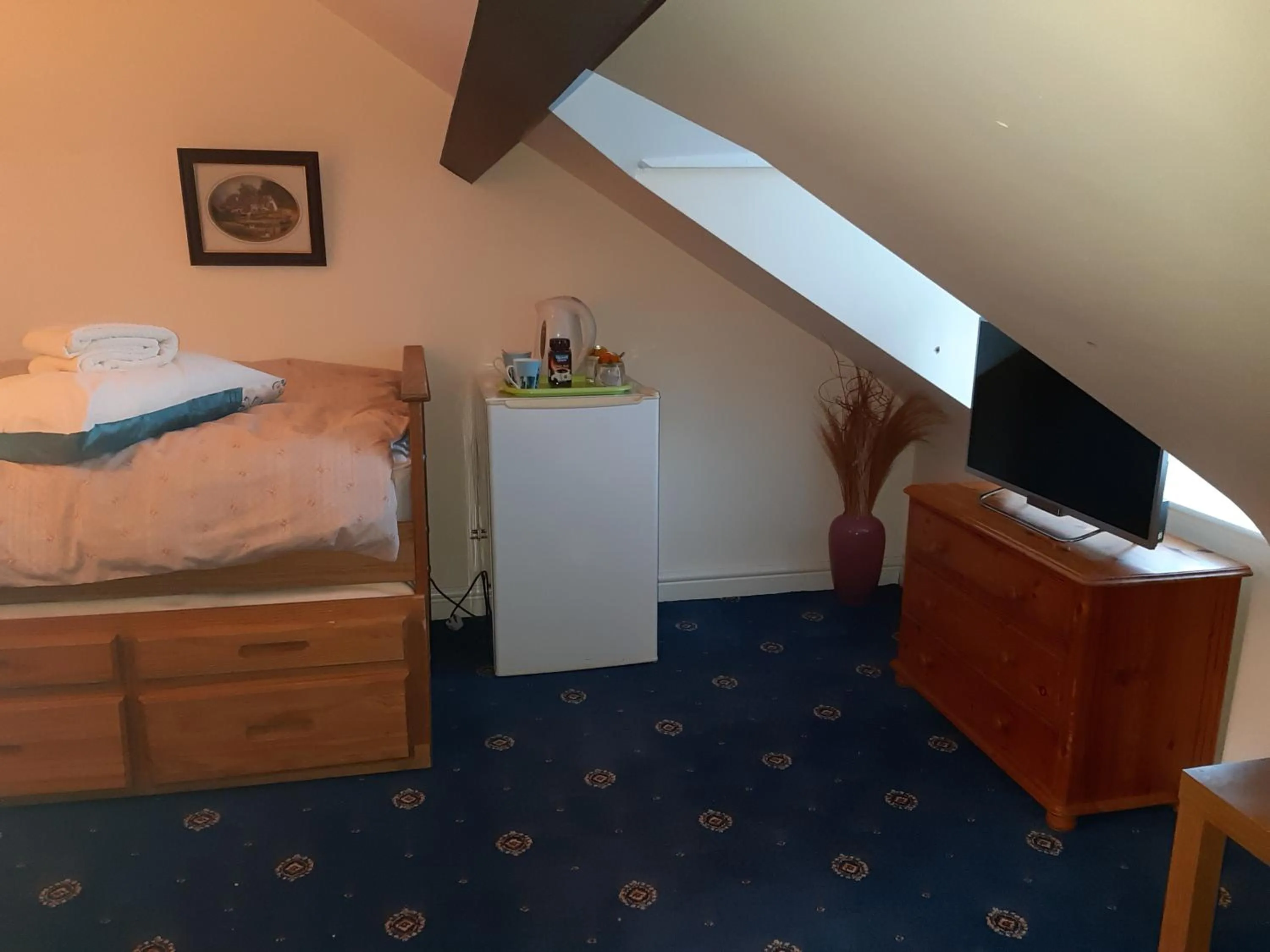 Bed in Phoenix Nights Guest House