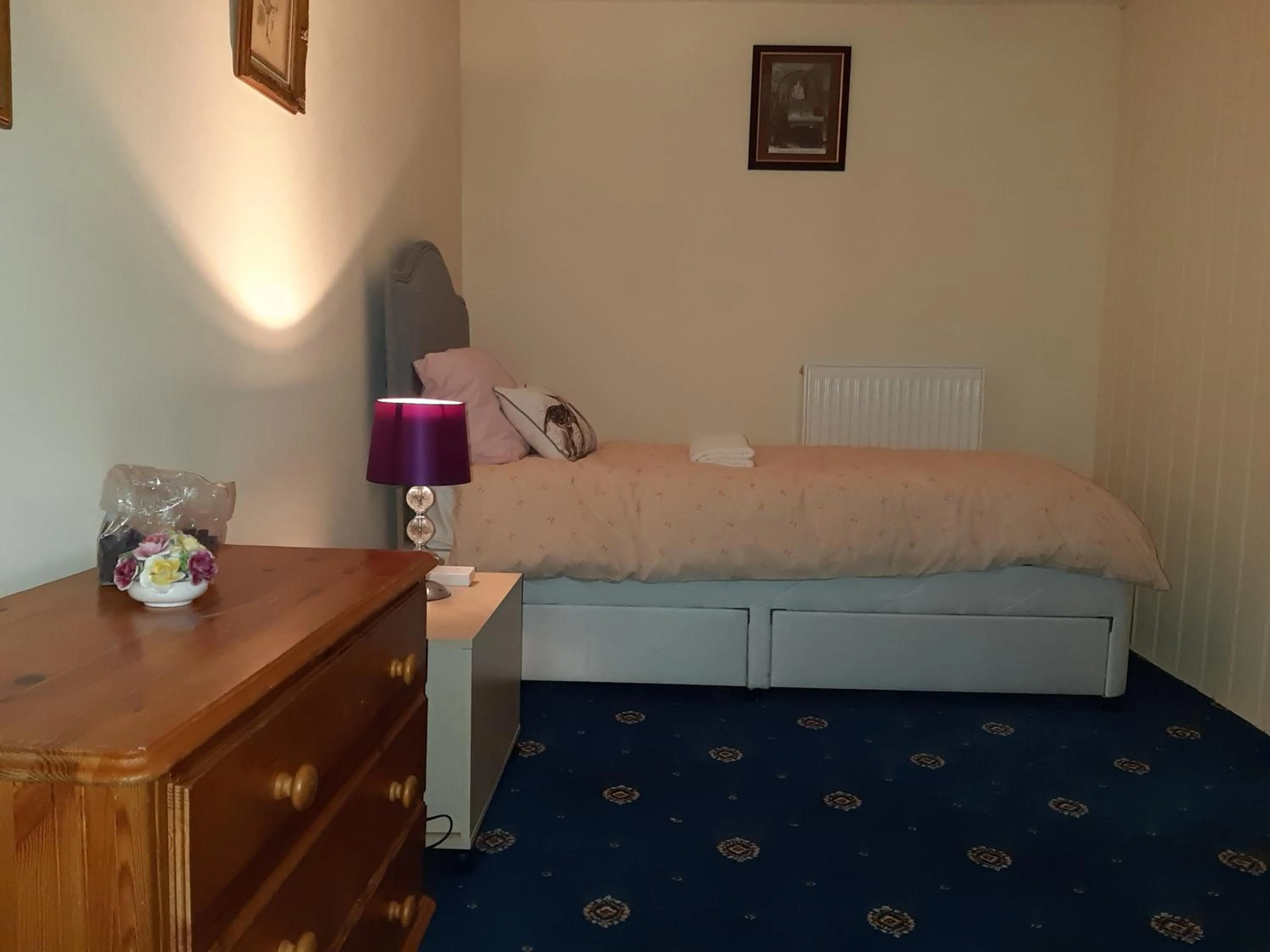 Bed in Phoenix Nights Guest House