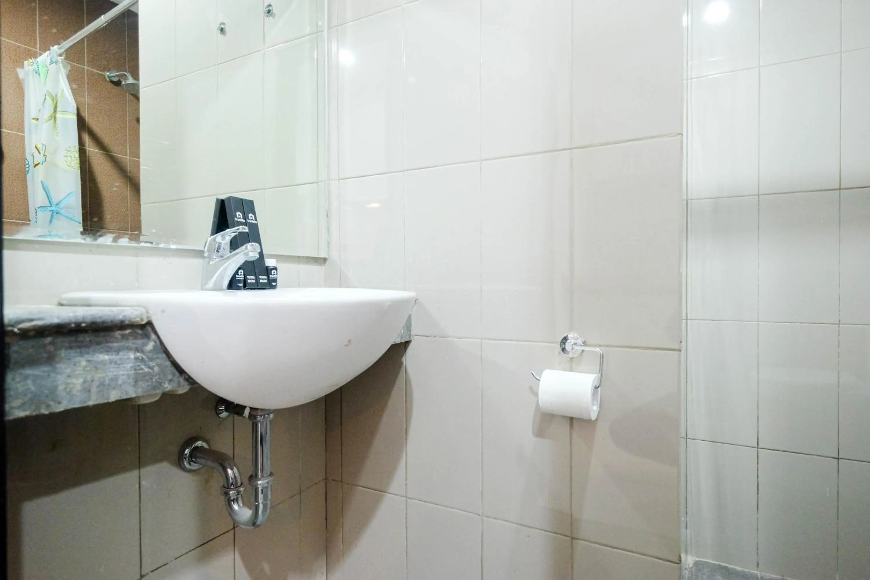 Bathroom in Cozy and Modern 1BR Apartment at Atlanta Residences By Travelio