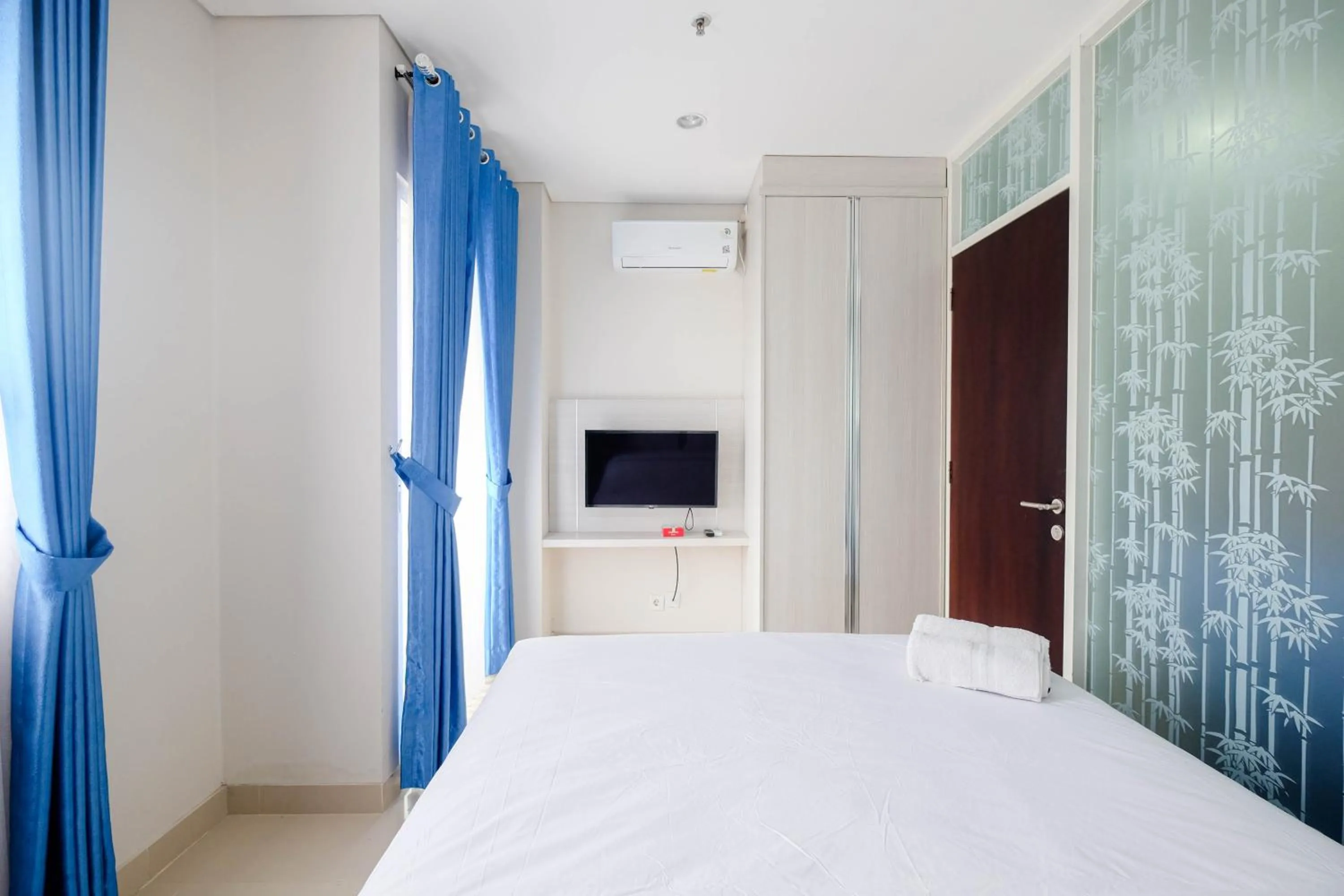 Bedroom, Bed in Cozy and Modern 1BR Apartment at Atlanta Residences By Travelio