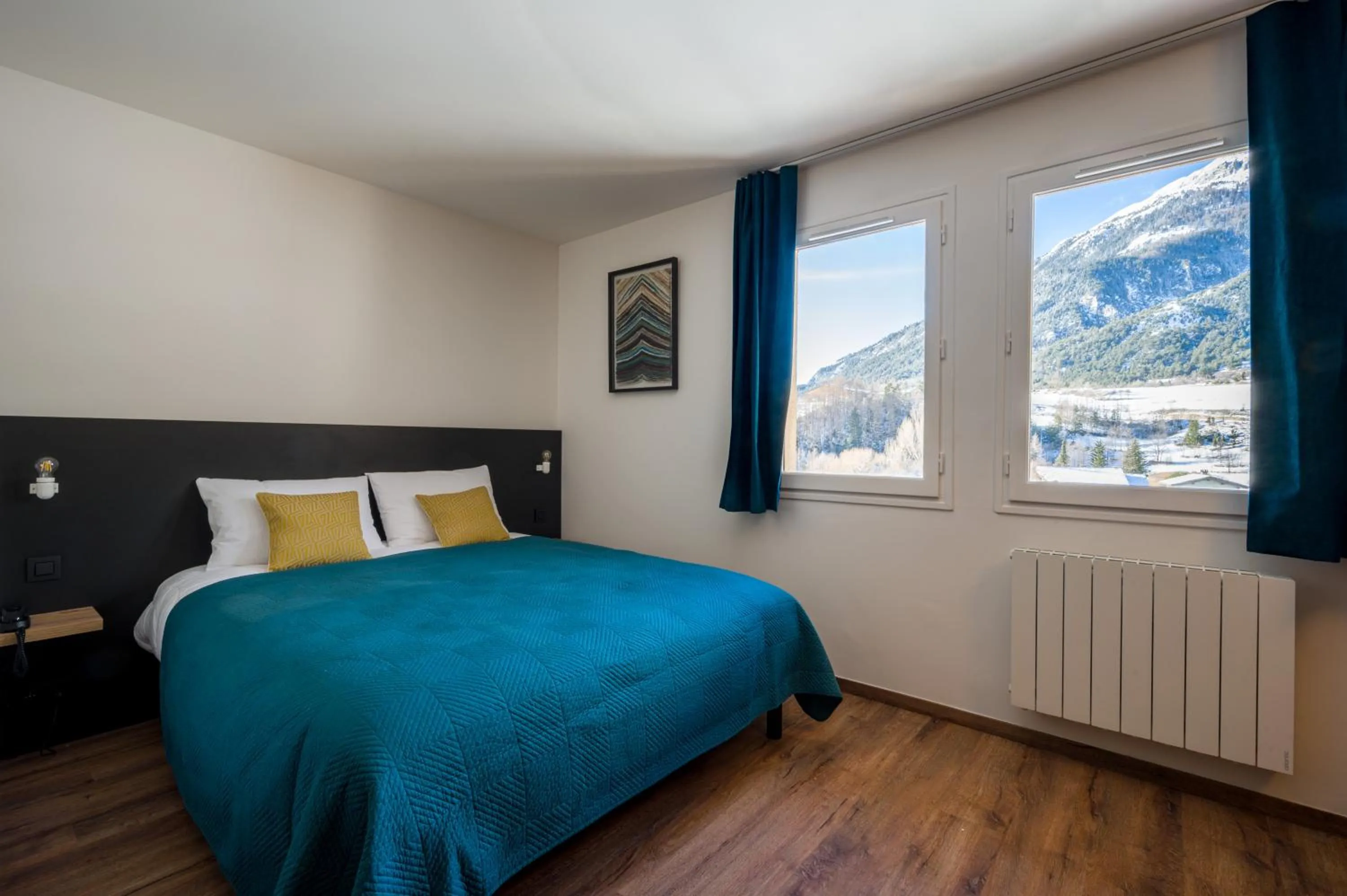 Bed in L'Outa Hotel Restaurant