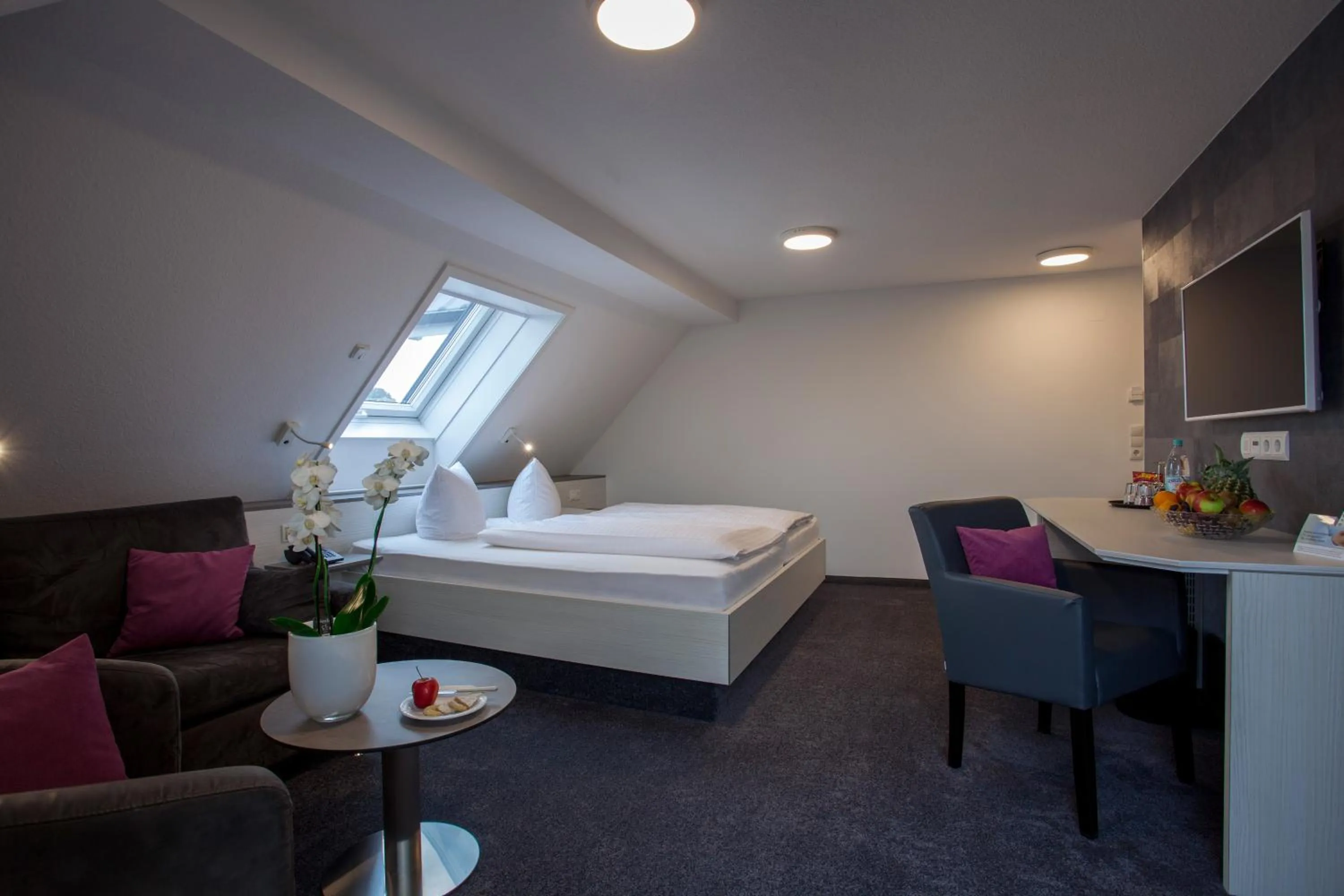Living room, Bed in Ebner - Boutique-Hotel & Konditorei