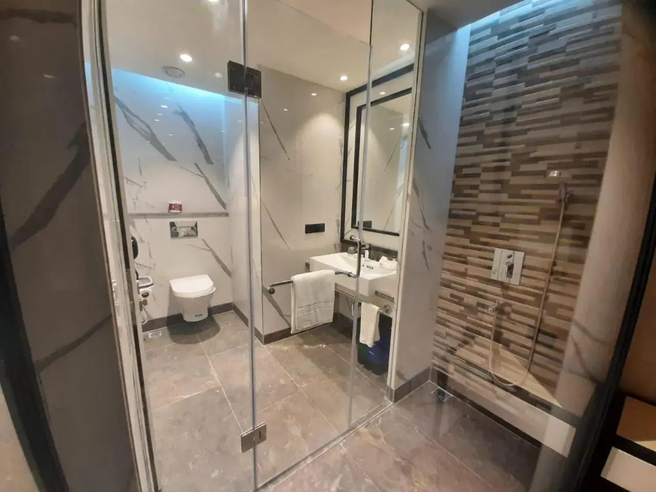 Bathroom in Hotel Polo Towers Agartala Bathroom in Hotel Polo Towers Agartala