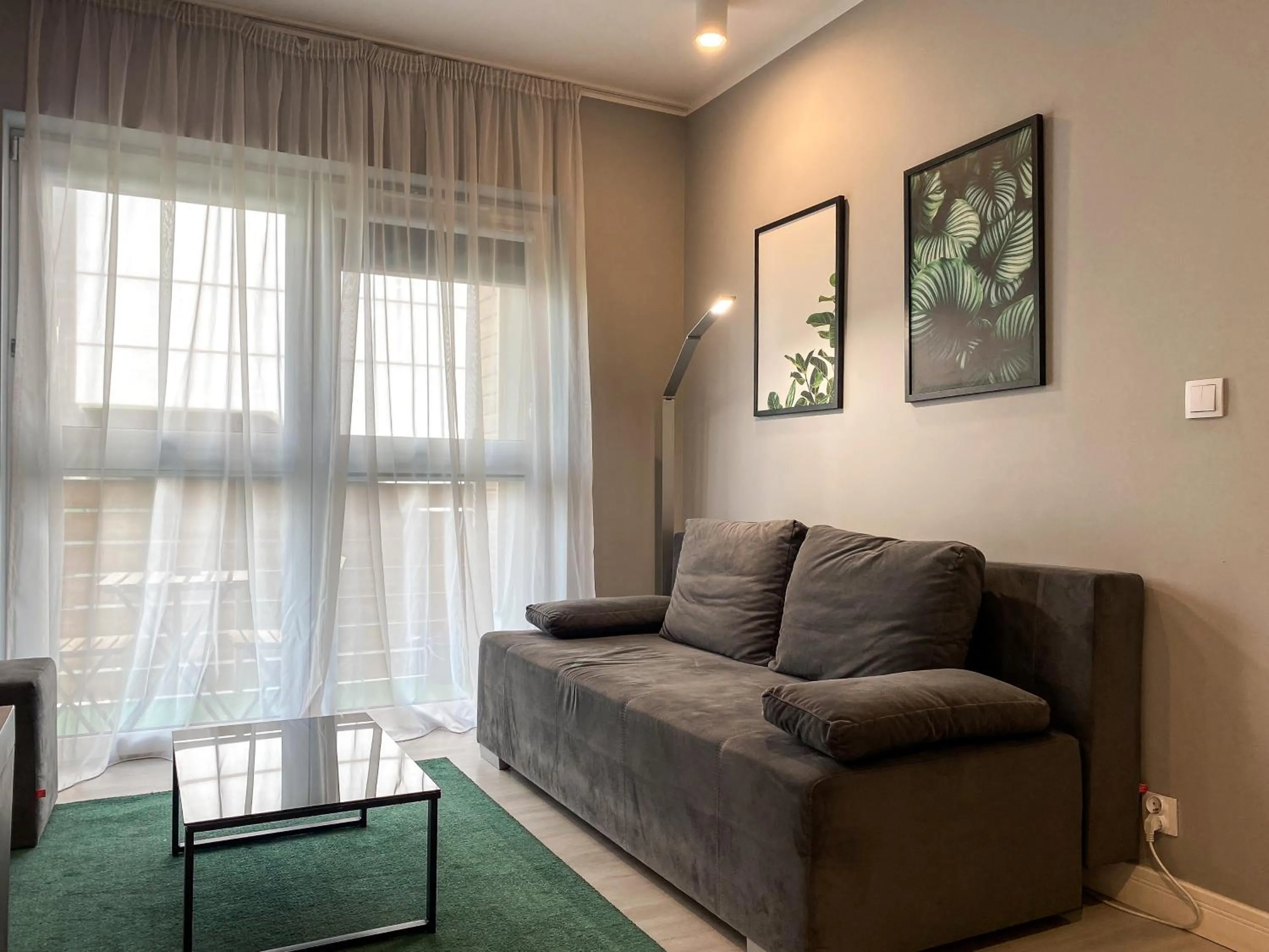Communal lounge/ TV room in BP Apartment IV