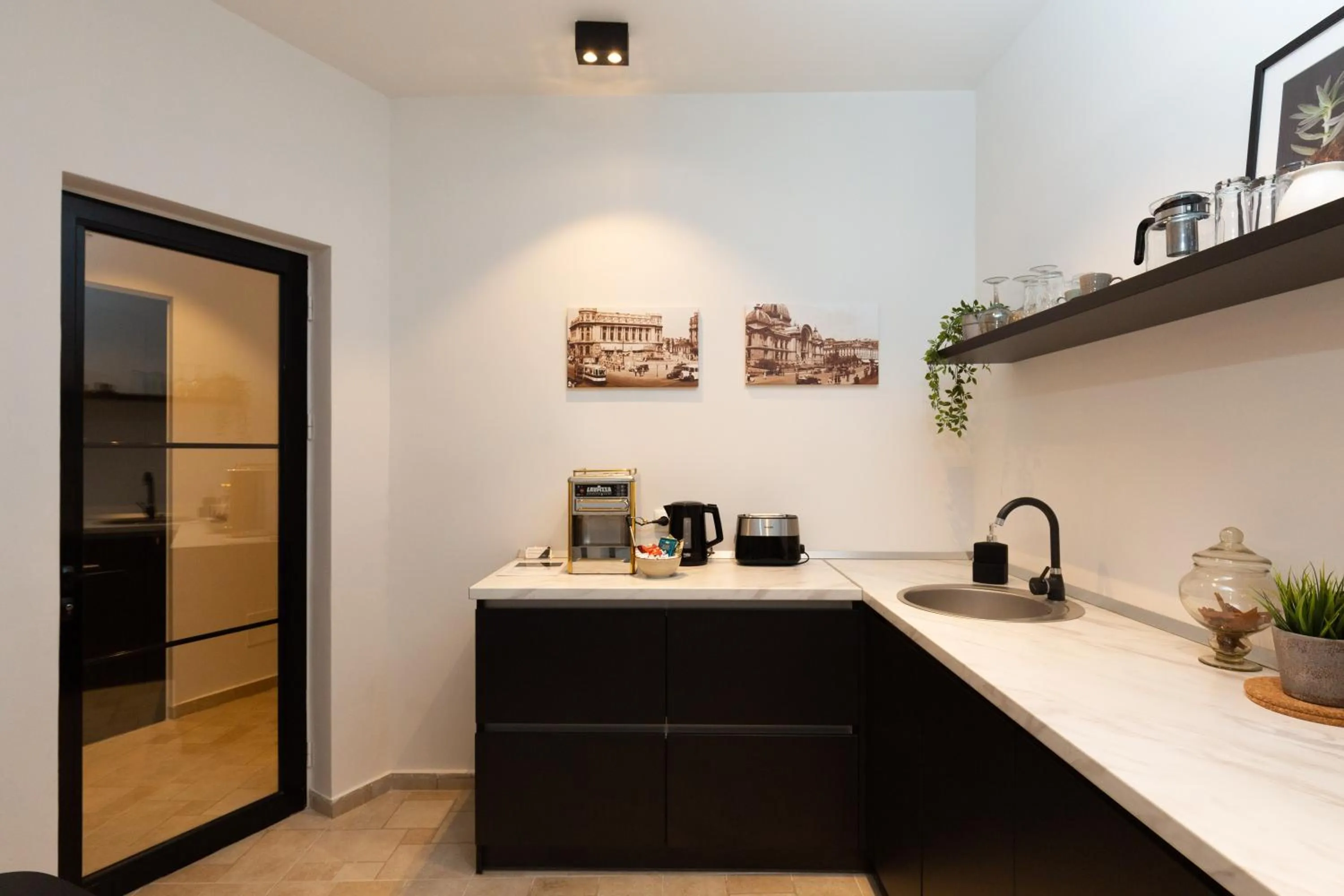kitchen in Metropole Apartments Royal Residence