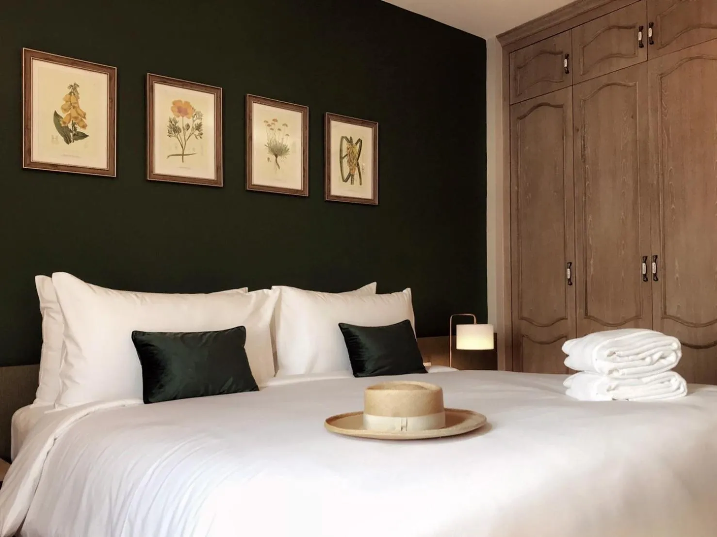 Bed in The Raintree Hotel Chiang Mai