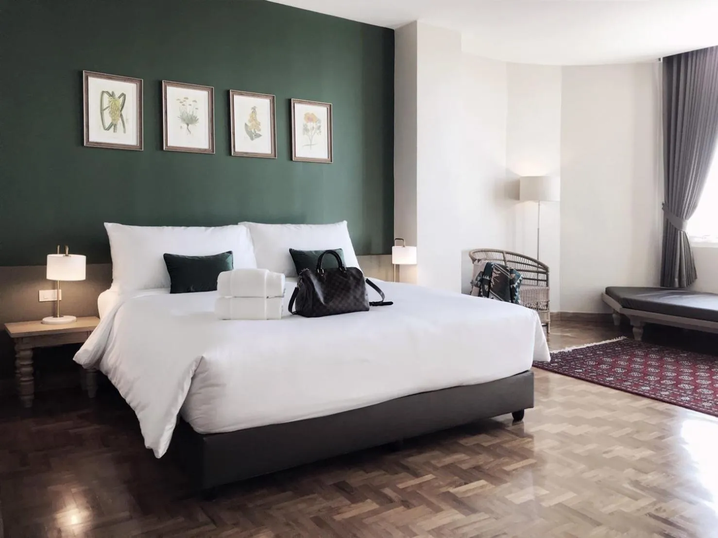 Bed in The Raintree Hotel Chiang Mai