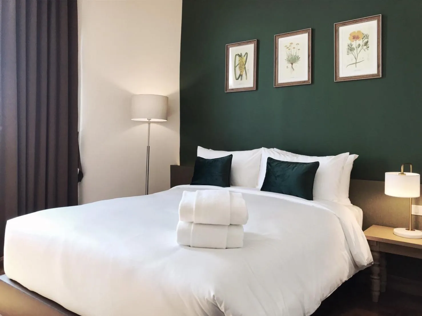 Bed in The Raintree Hotel Chiang Mai