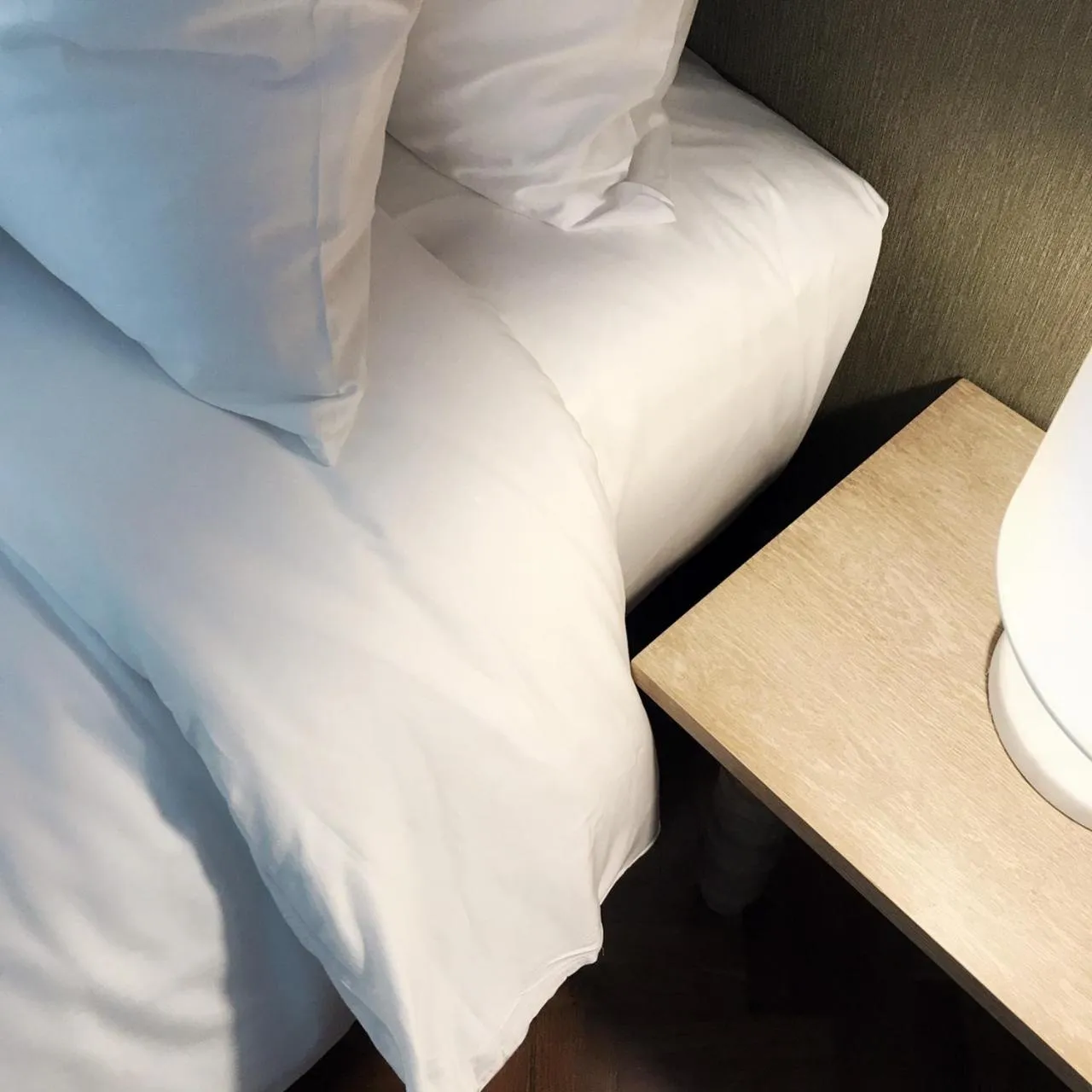 Bed in The Raintree Hotel Chiang Mai