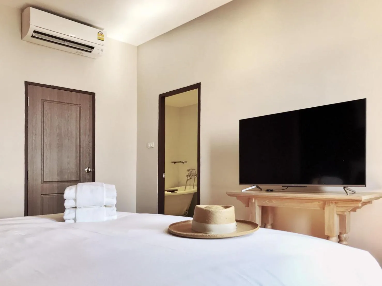 Bed in The Raintree Hotel Chiang Mai