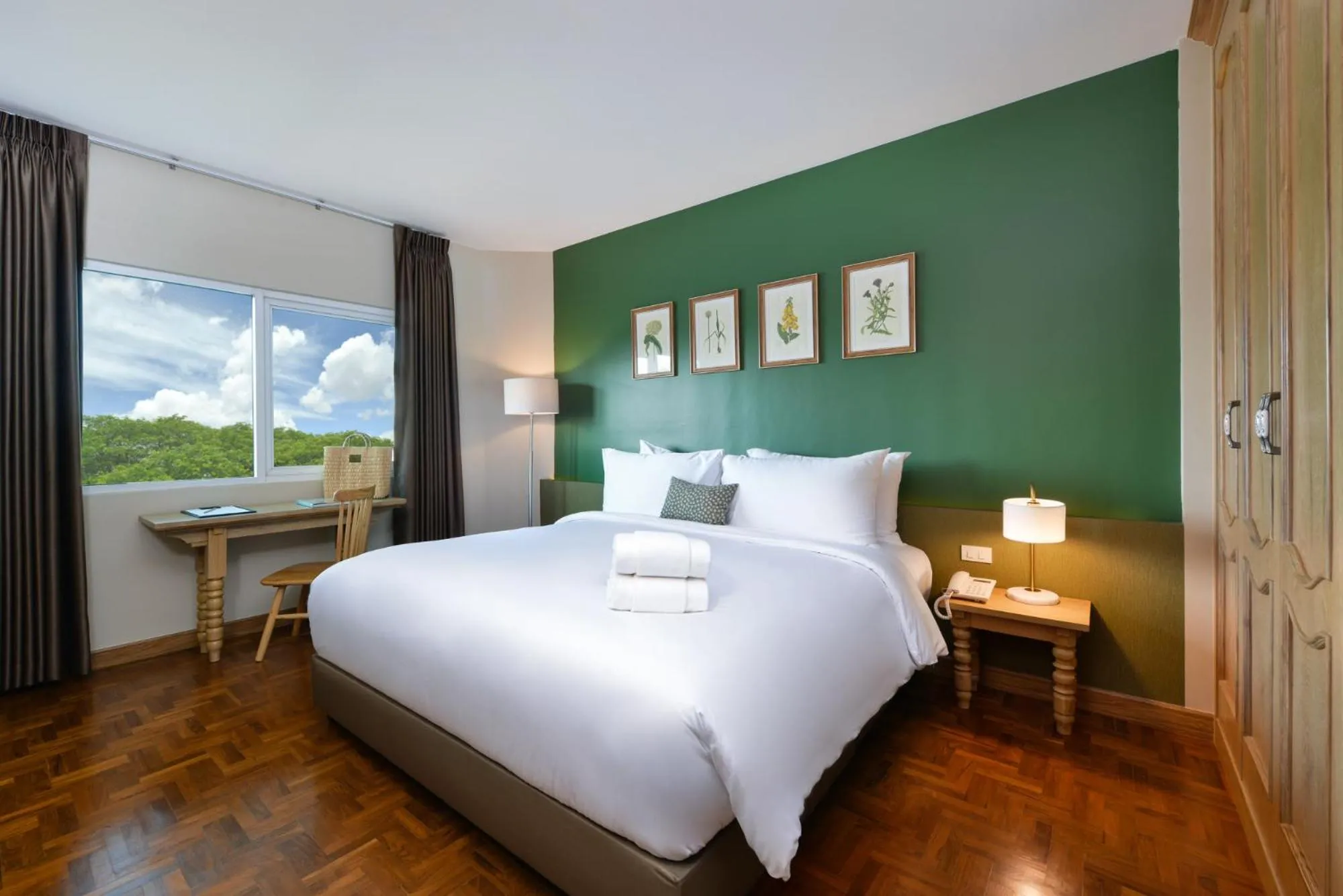 Bed in The Raintree Hotel Chiang Mai