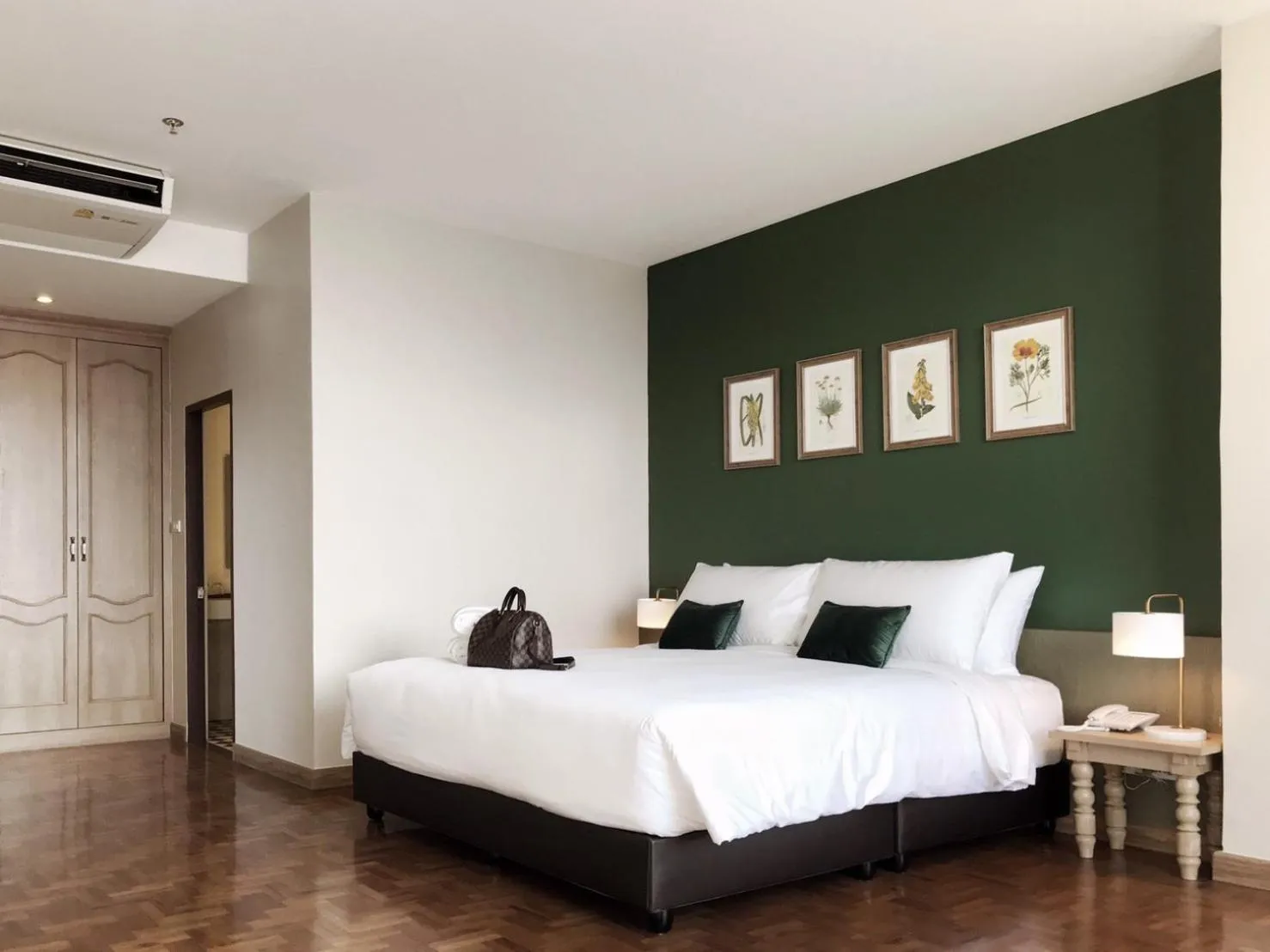 Bed in The Raintree Hotel Chiang Mai