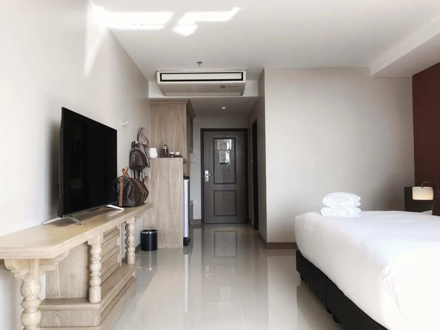 Bed in The Raintree Hotel Chiang Mai