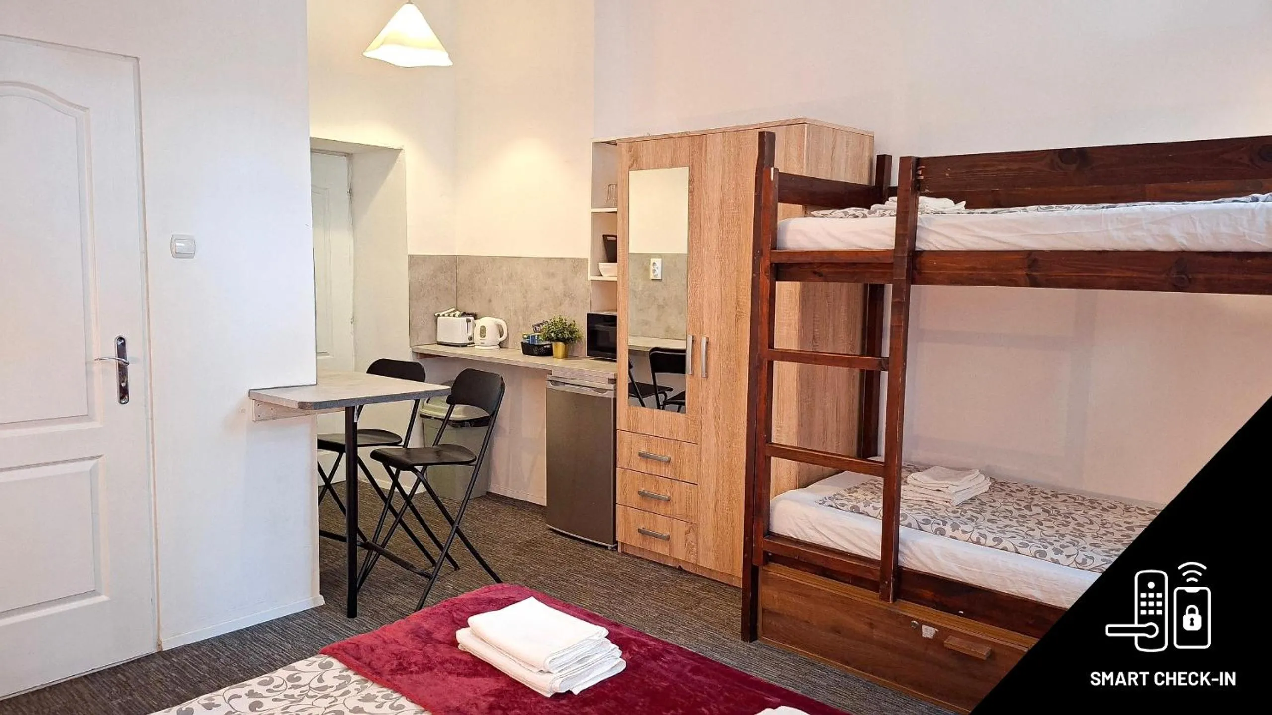 Bed in GoodMo Budapest Smart Rooms