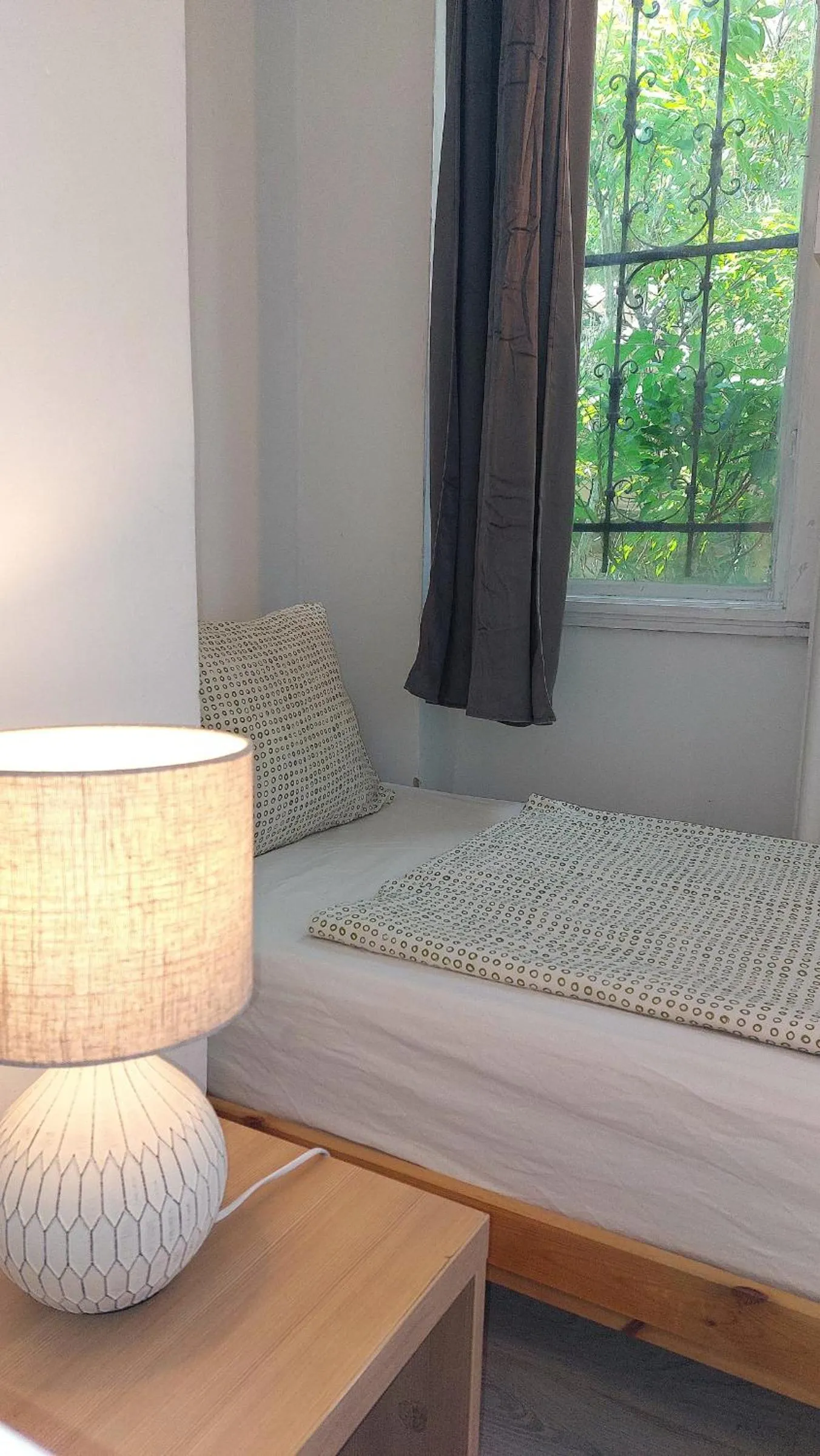 Bed in GoodMo Budapest Smart Rooms