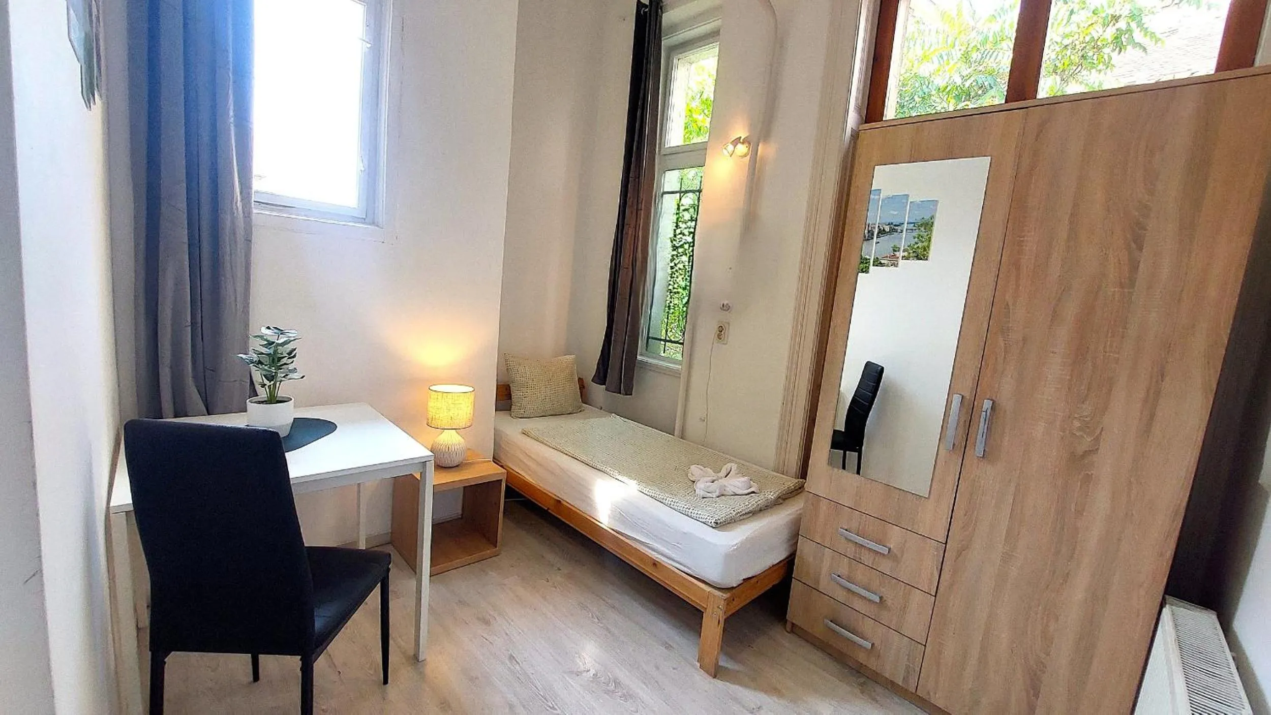 Bed in GoodMo Budapest Smart Rooms
