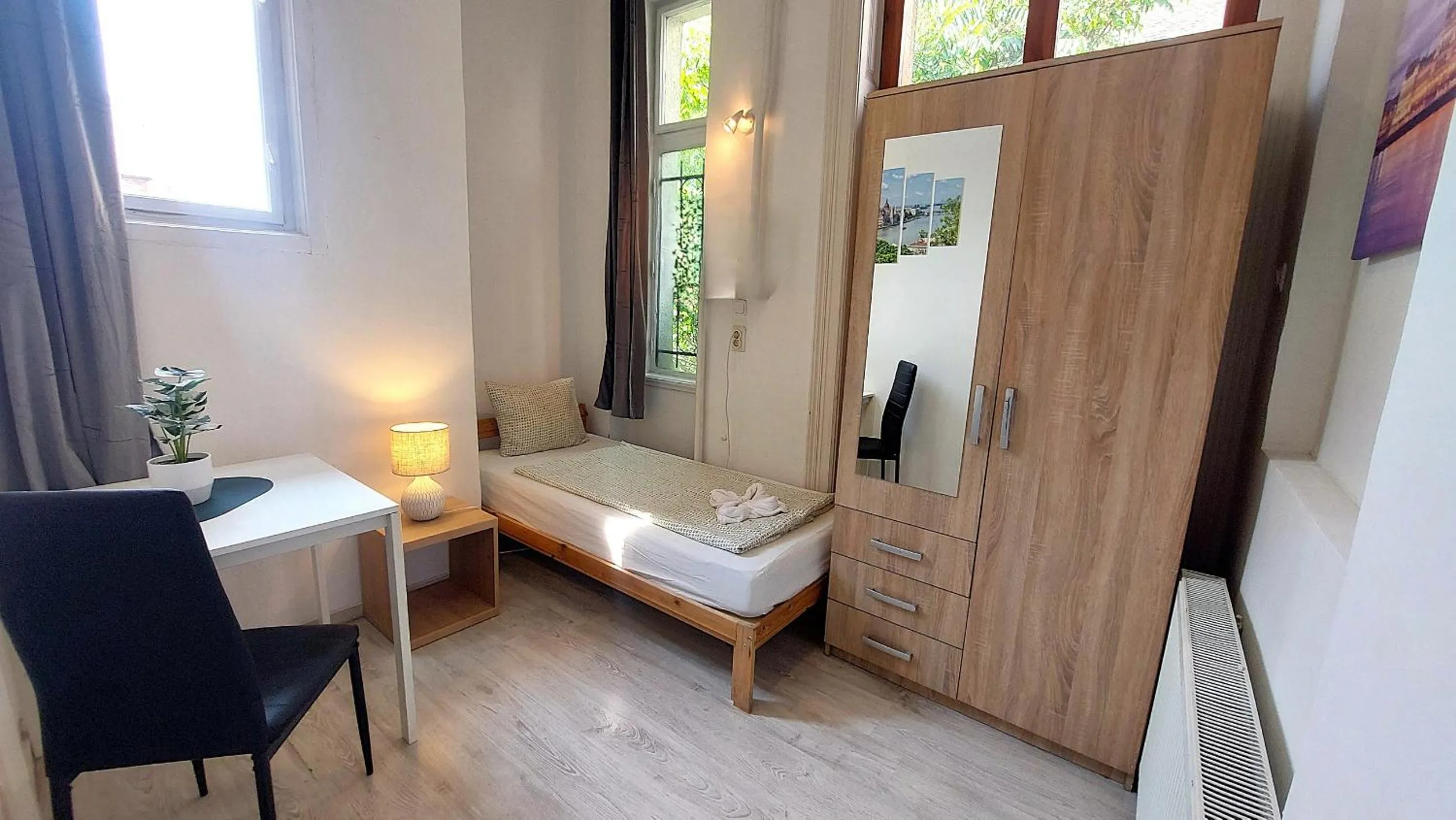 Bed in GoodMo Budapest Smart Rooms