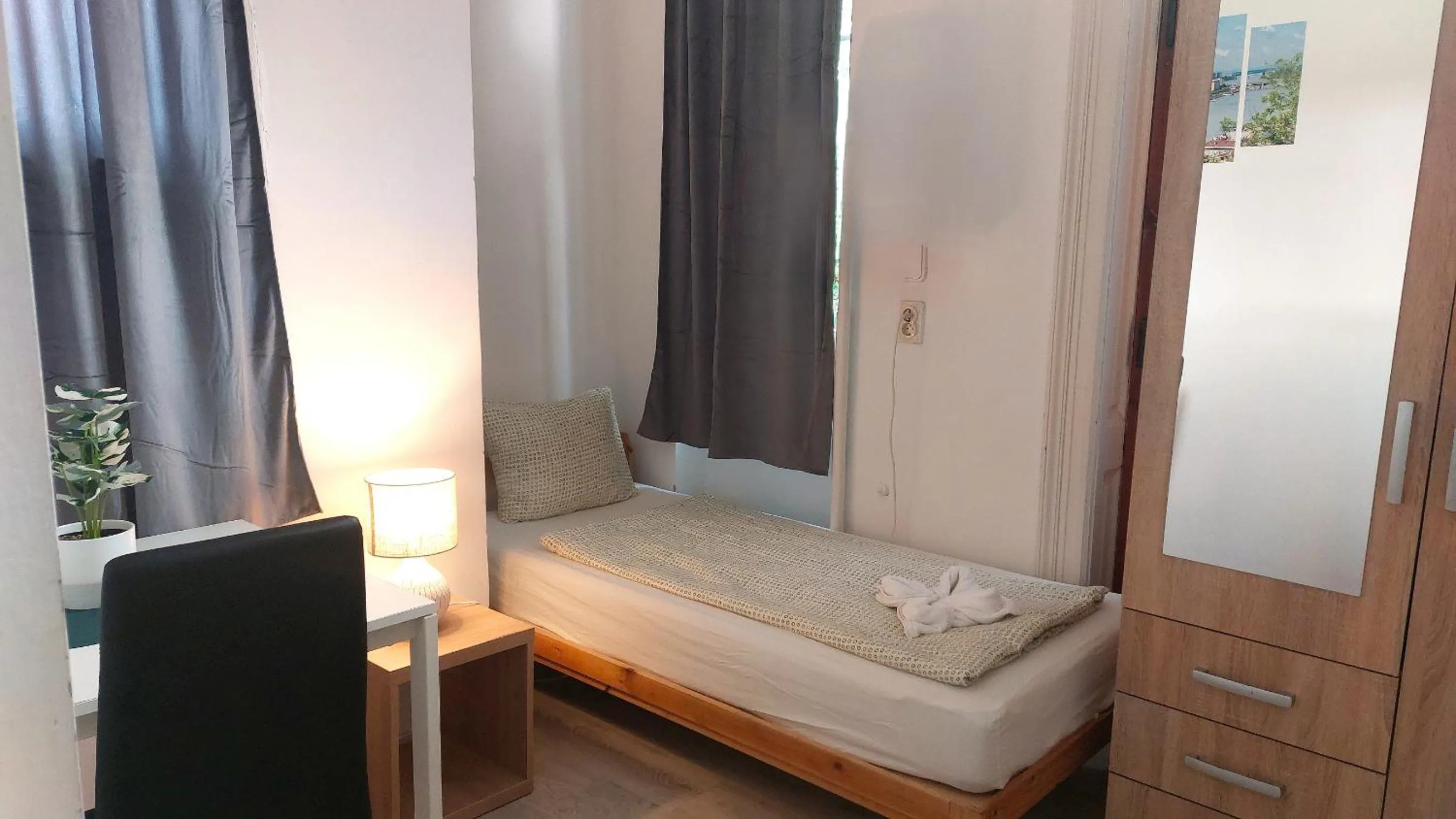 Bed in GoodMo Budapest Smart Rooms