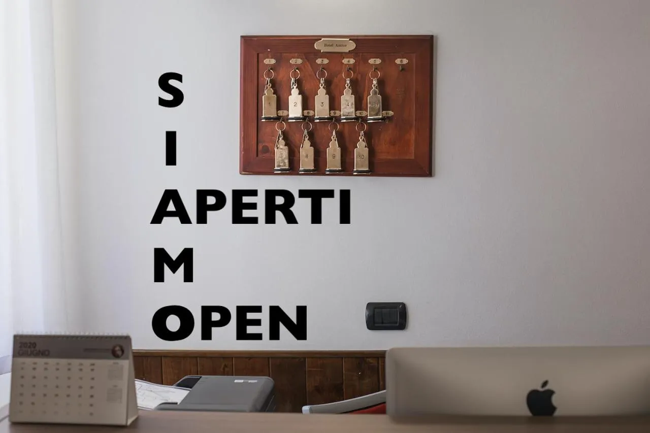 Property logo or sign in Hotel Amico