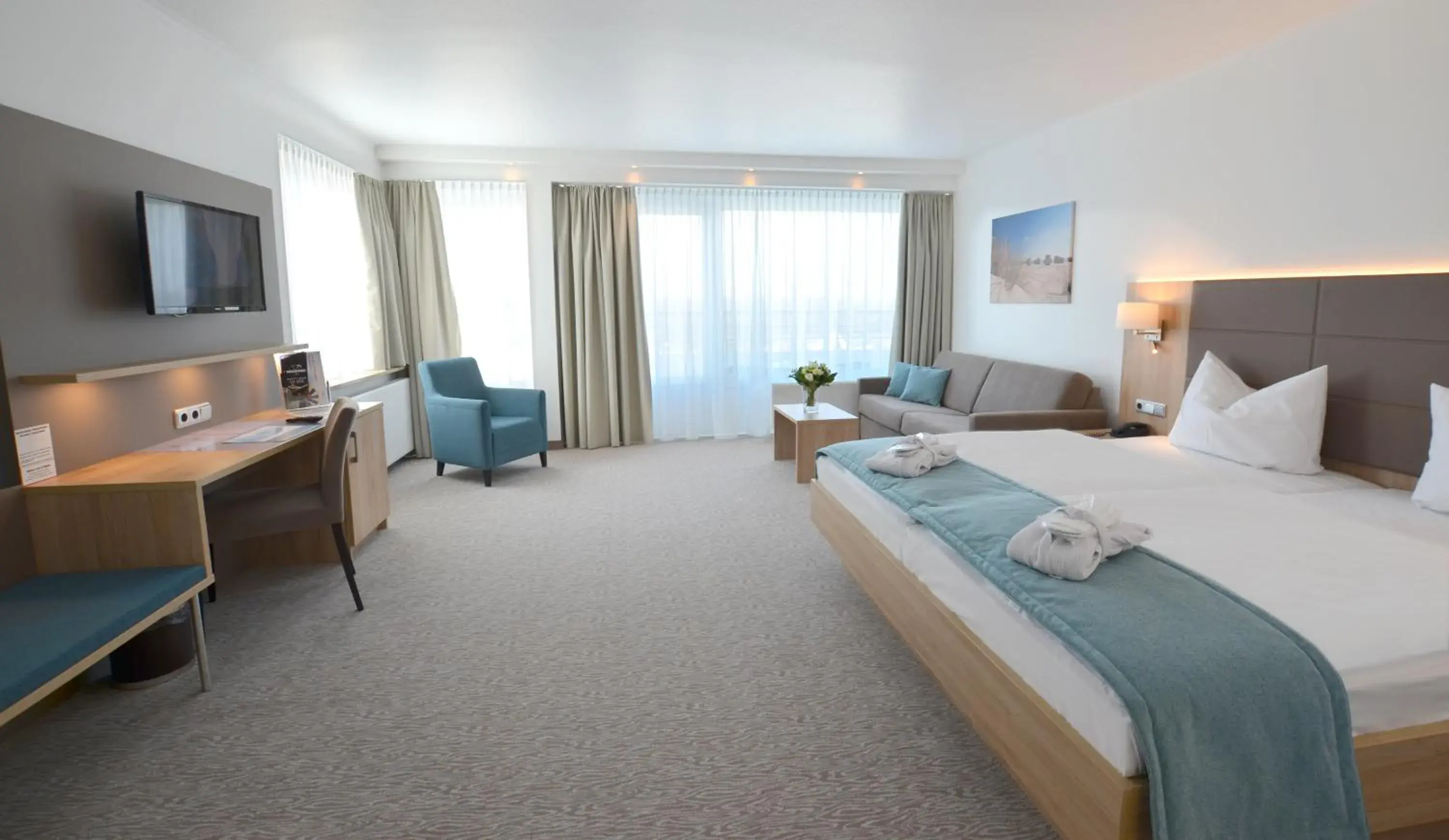 Bedroom in Carat Golf & Sporthotel