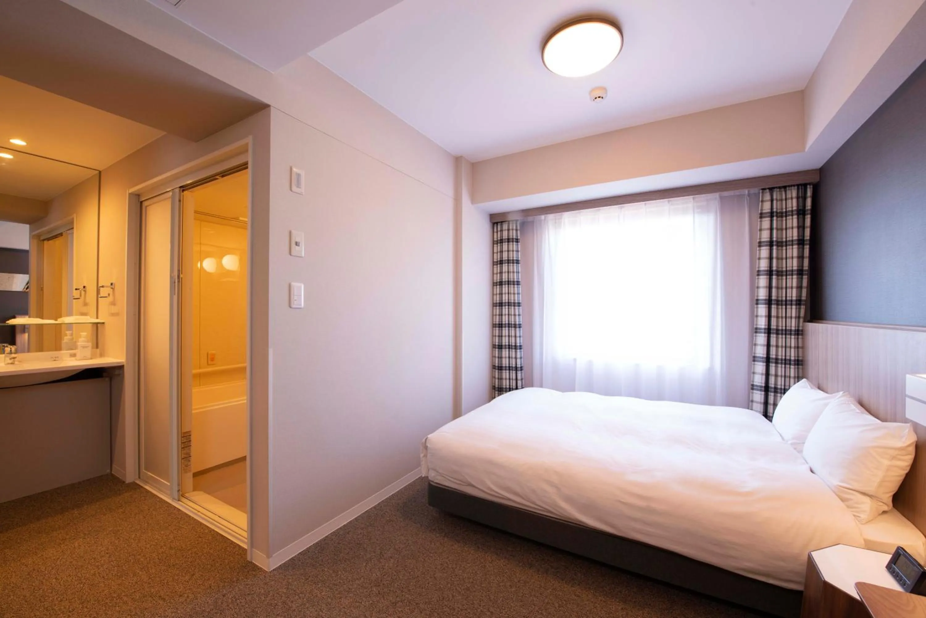 Bed in Shinrin Hotel