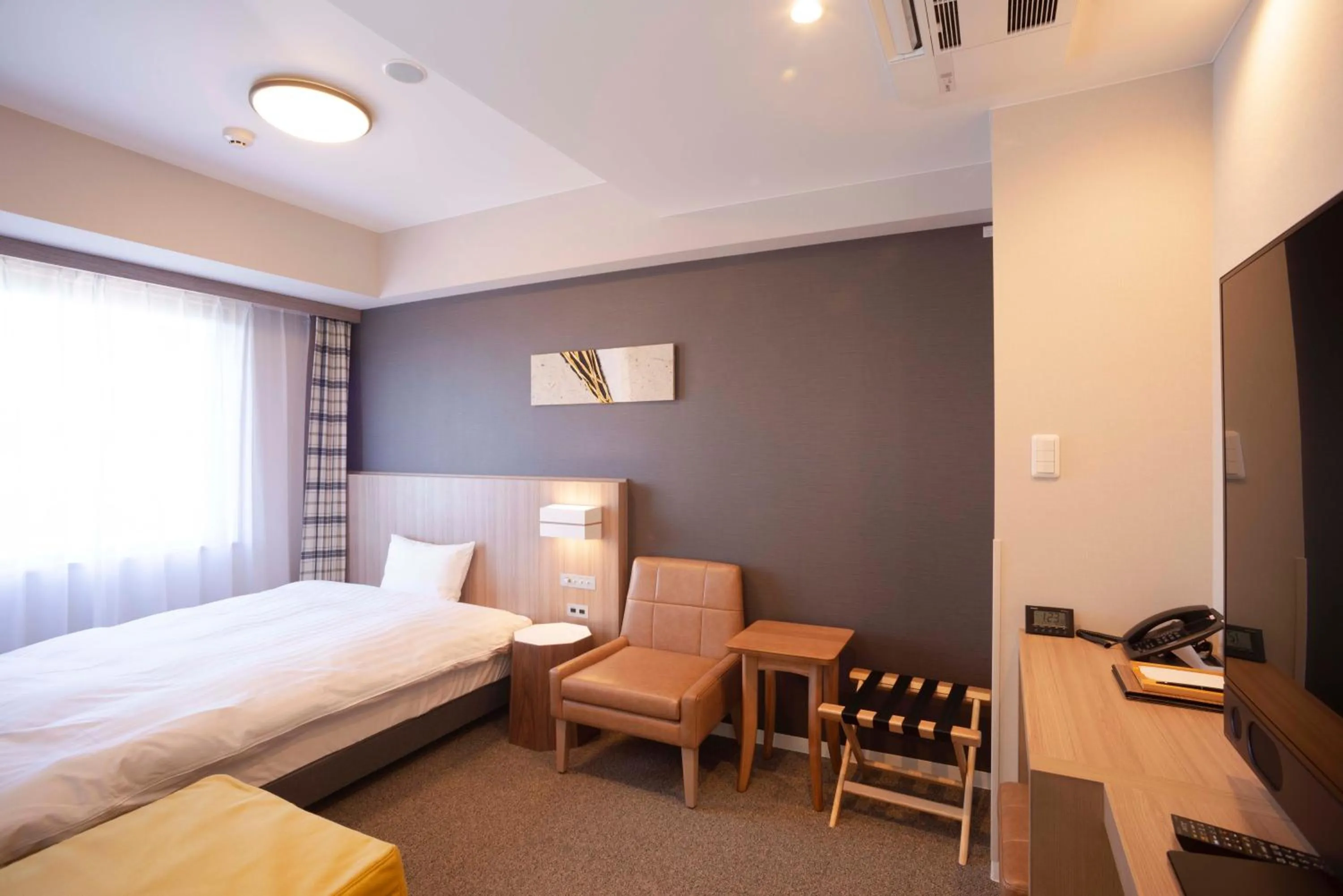 Bed in Shinrin Hotel