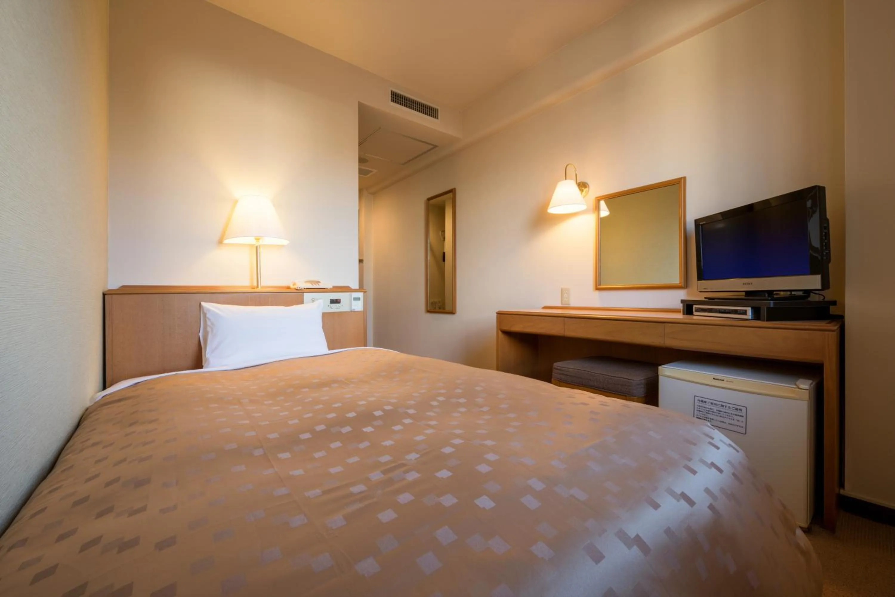 Photo of the whole room, Bed in Pacific Hotel Shiroishi