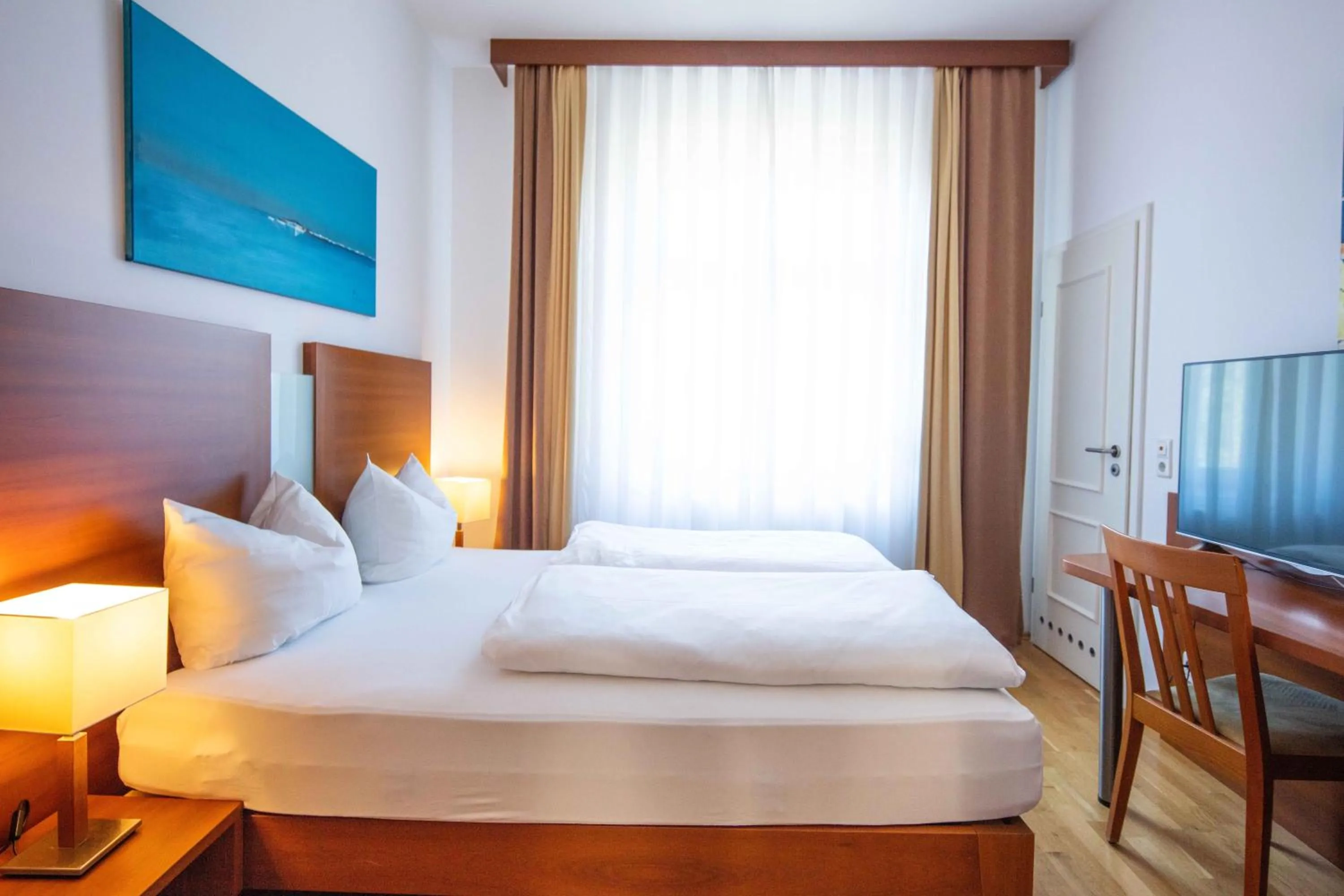 Photo of the whole room, Bed in Hotel Graf Zeppelin