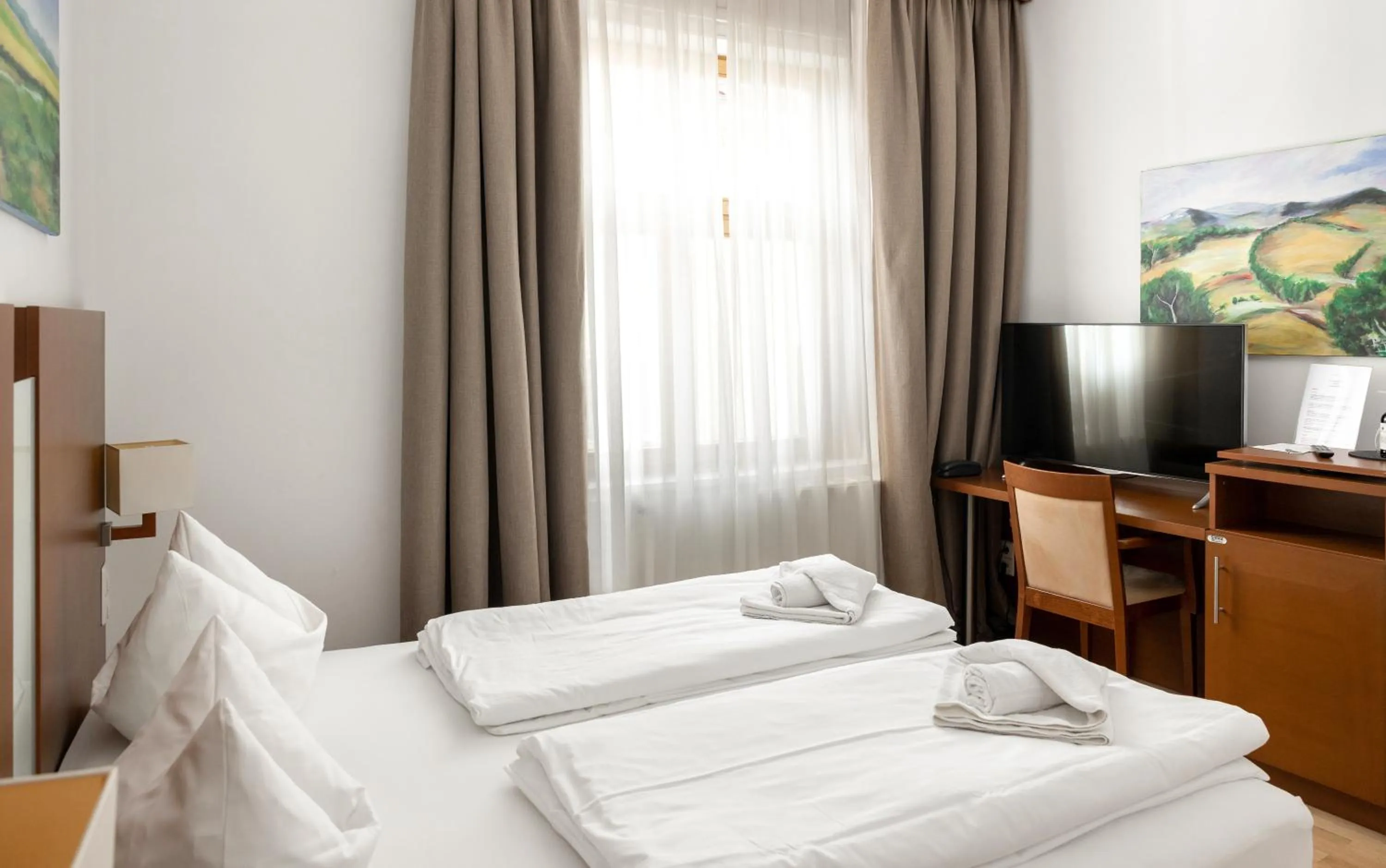 Bed in Hotel Graf Zeppelin