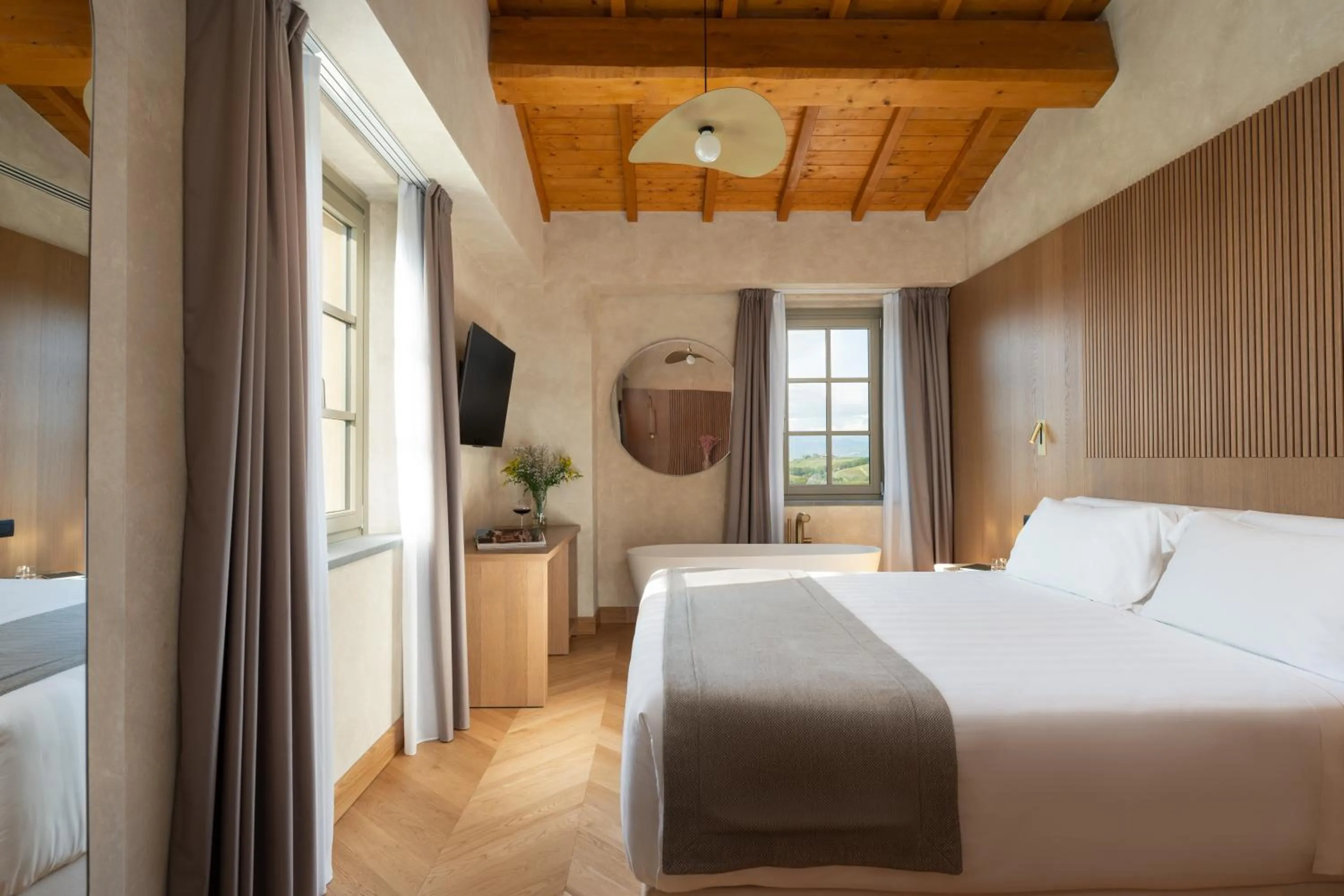 Bed in Villa Petriolo - Small Luxury Hotels of the World