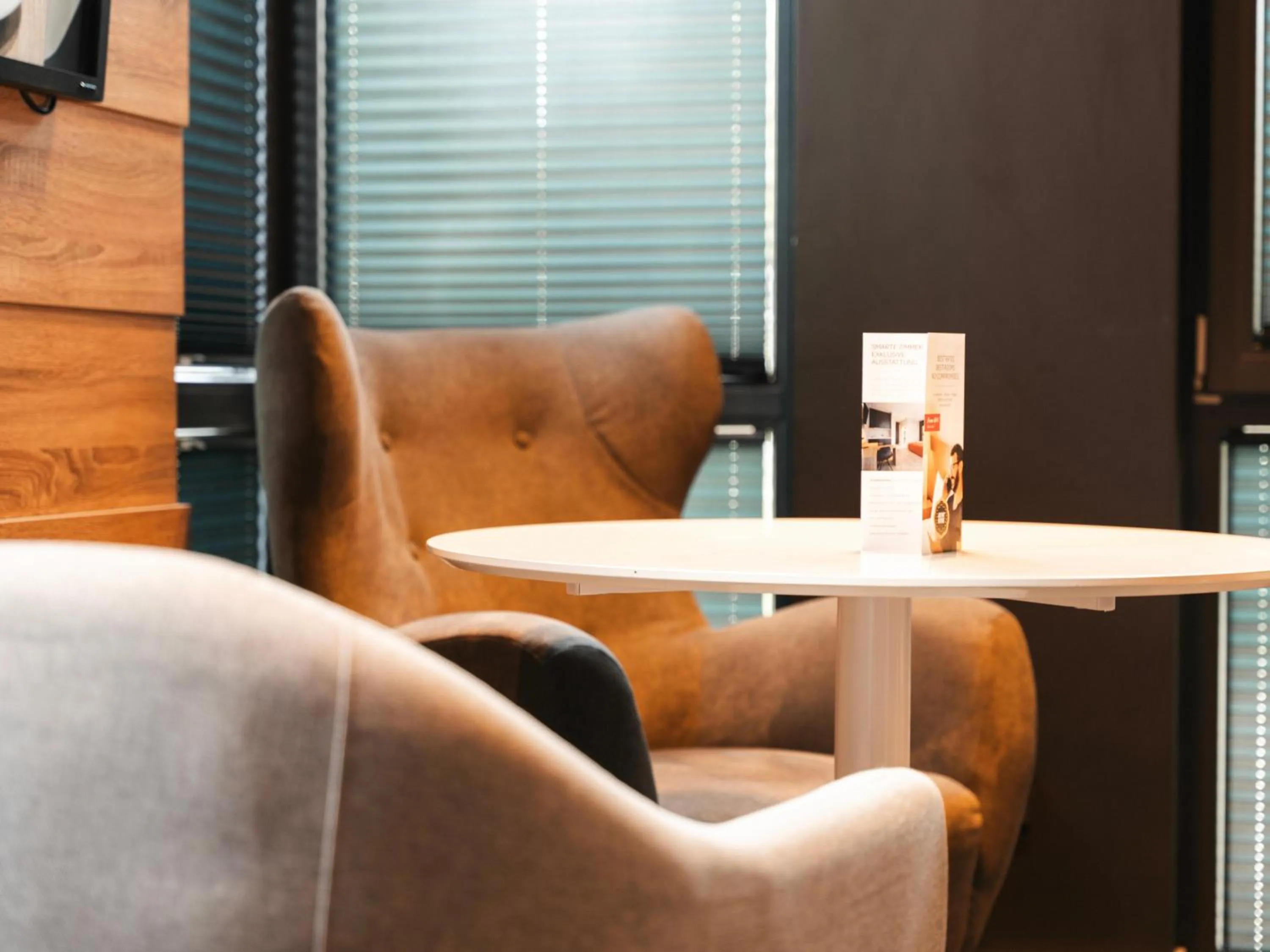 TV and multimedia in JustStay Grevenbroich Hotel & Apartments