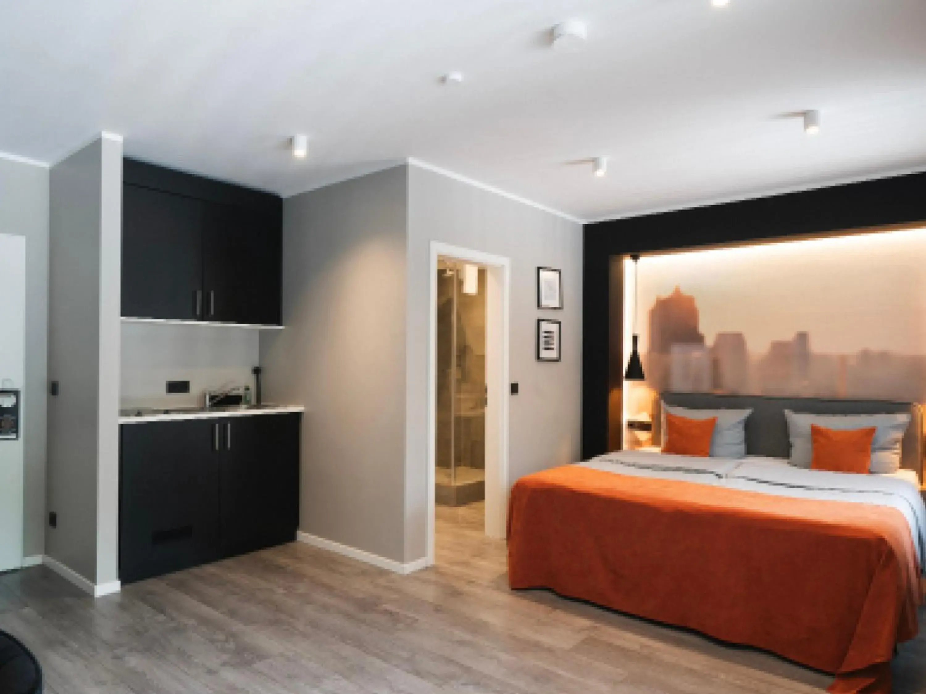 Shower, Bed in JustStay Solingen Hotel & Apartments Shower, Bed in JustStay Solingen Hotel & Apartments