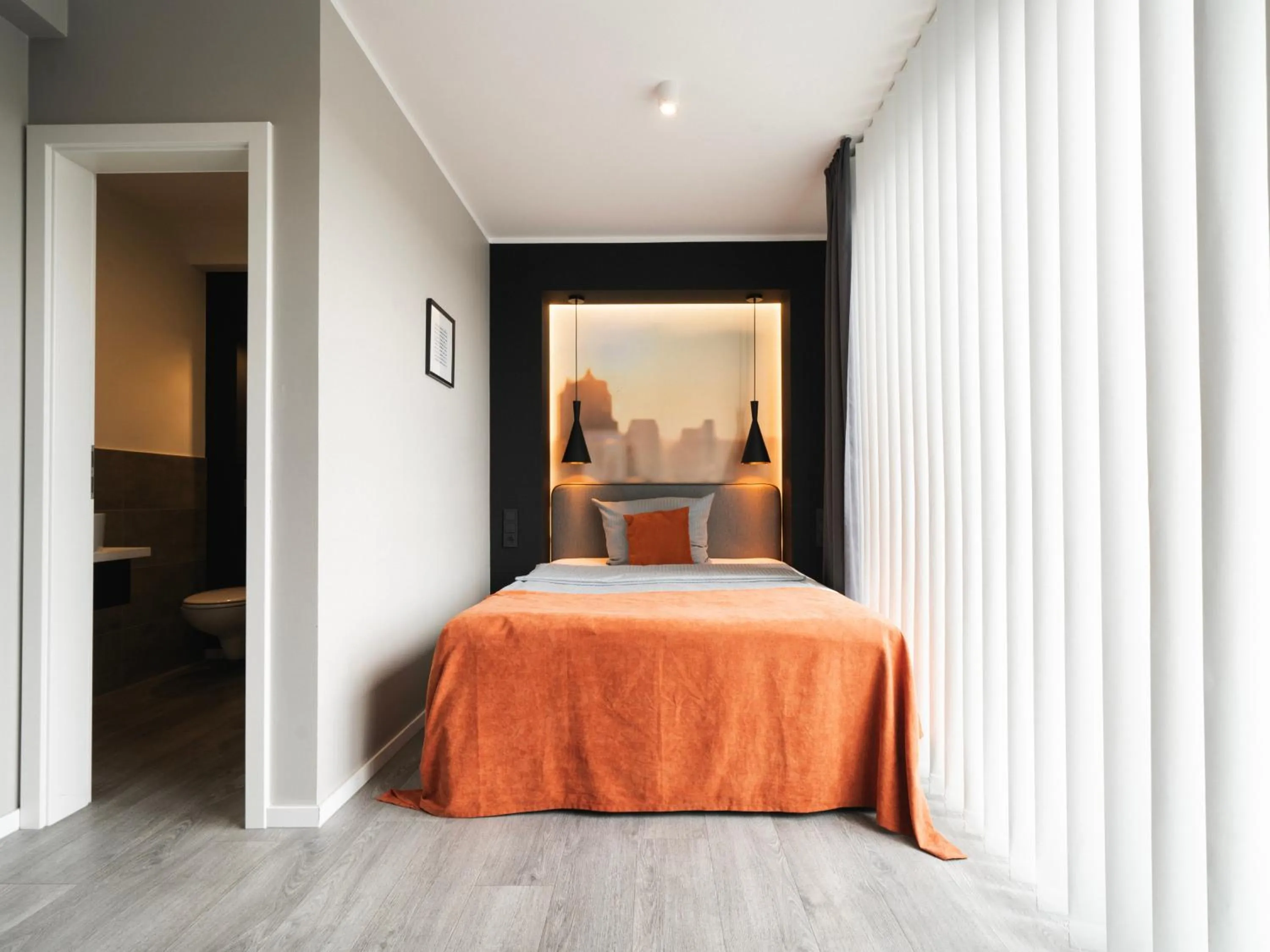 Bed in JustStay Solingen Hotel & Apartments