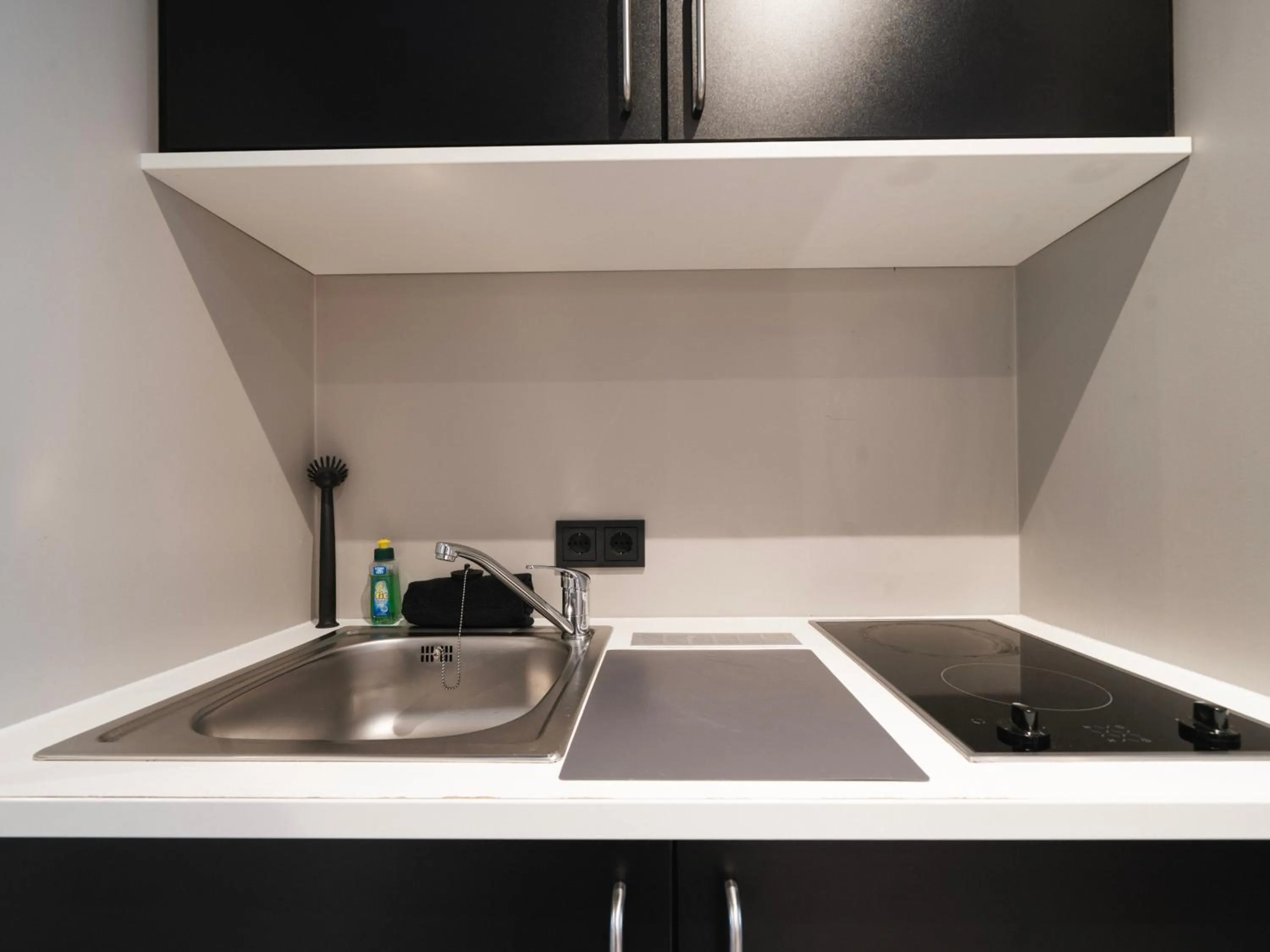 Kitchen or kitchenette in JustStay Solingen Hotel & Apartments