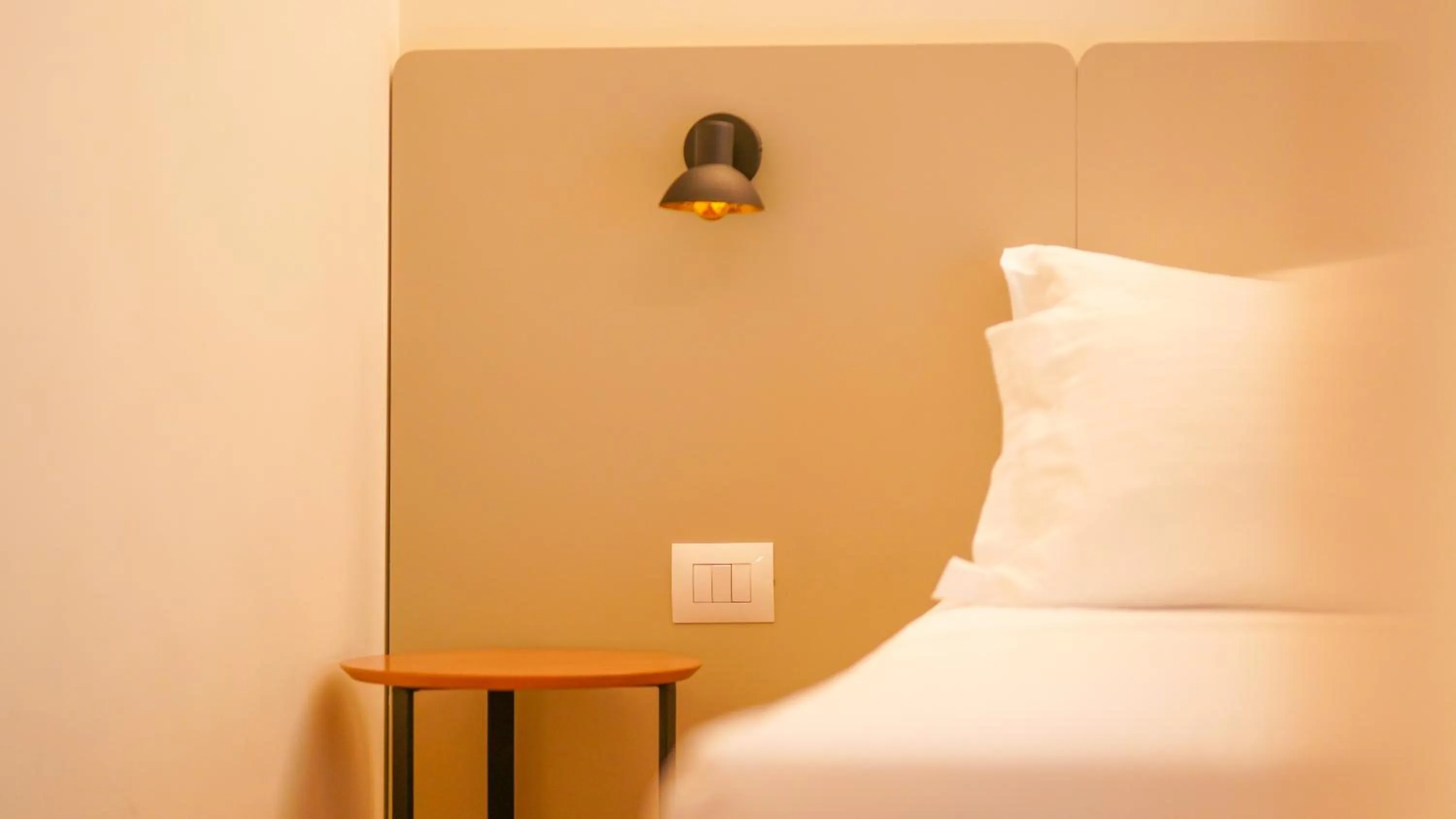 Bed in Hotel Theatro- City Center