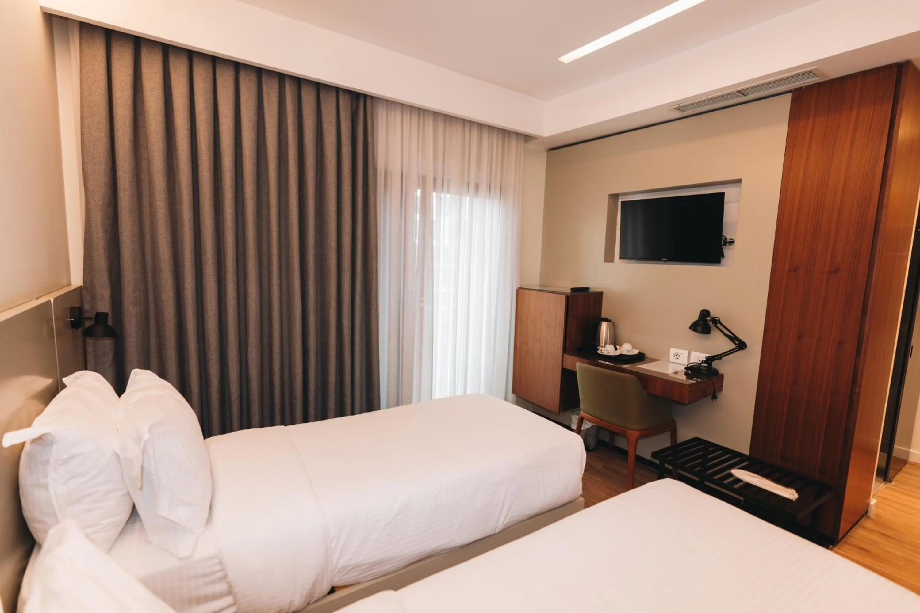 Bed in Hotel Theatro- City Center