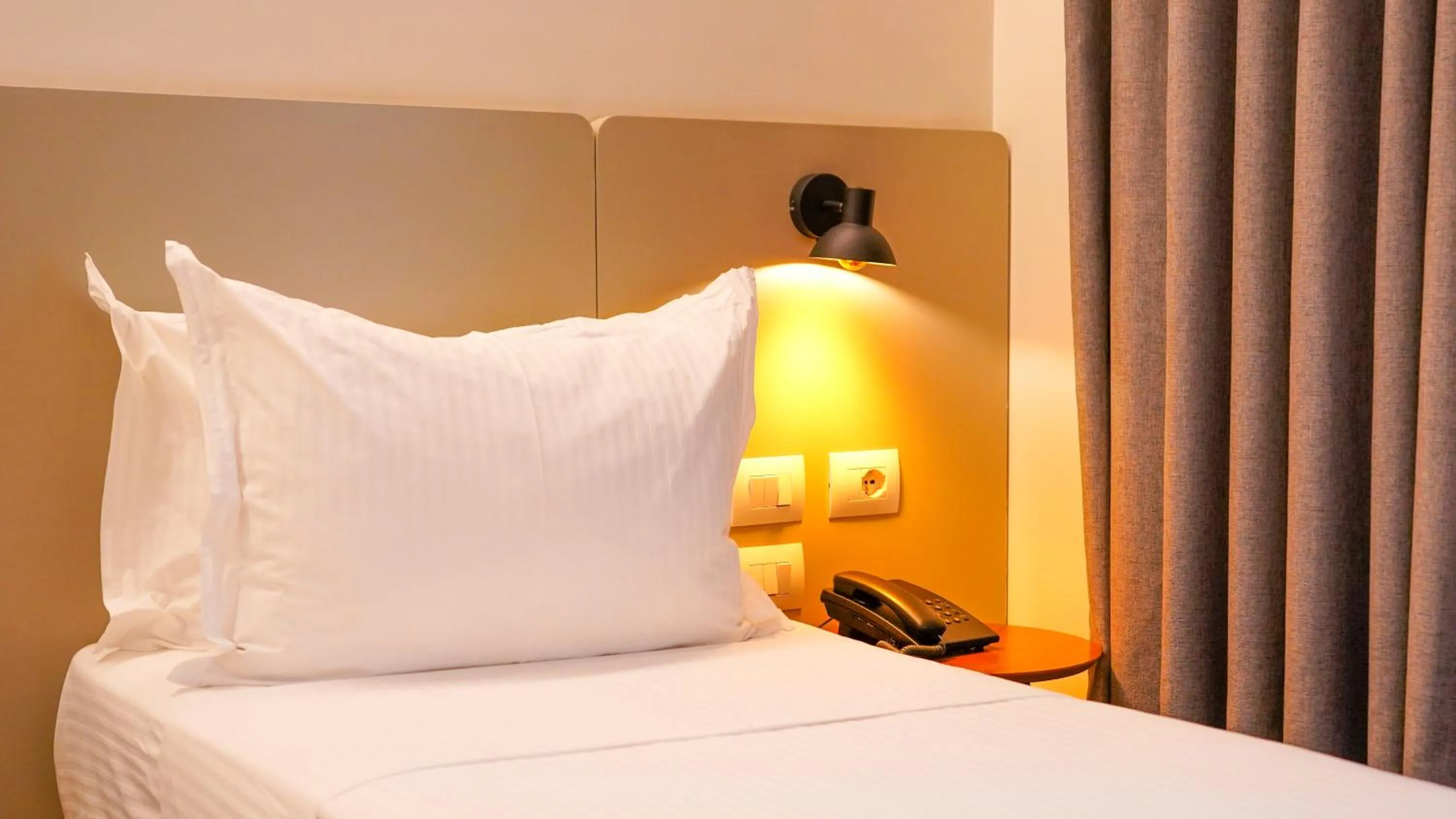 Bed in Hotel Theatro- City Center